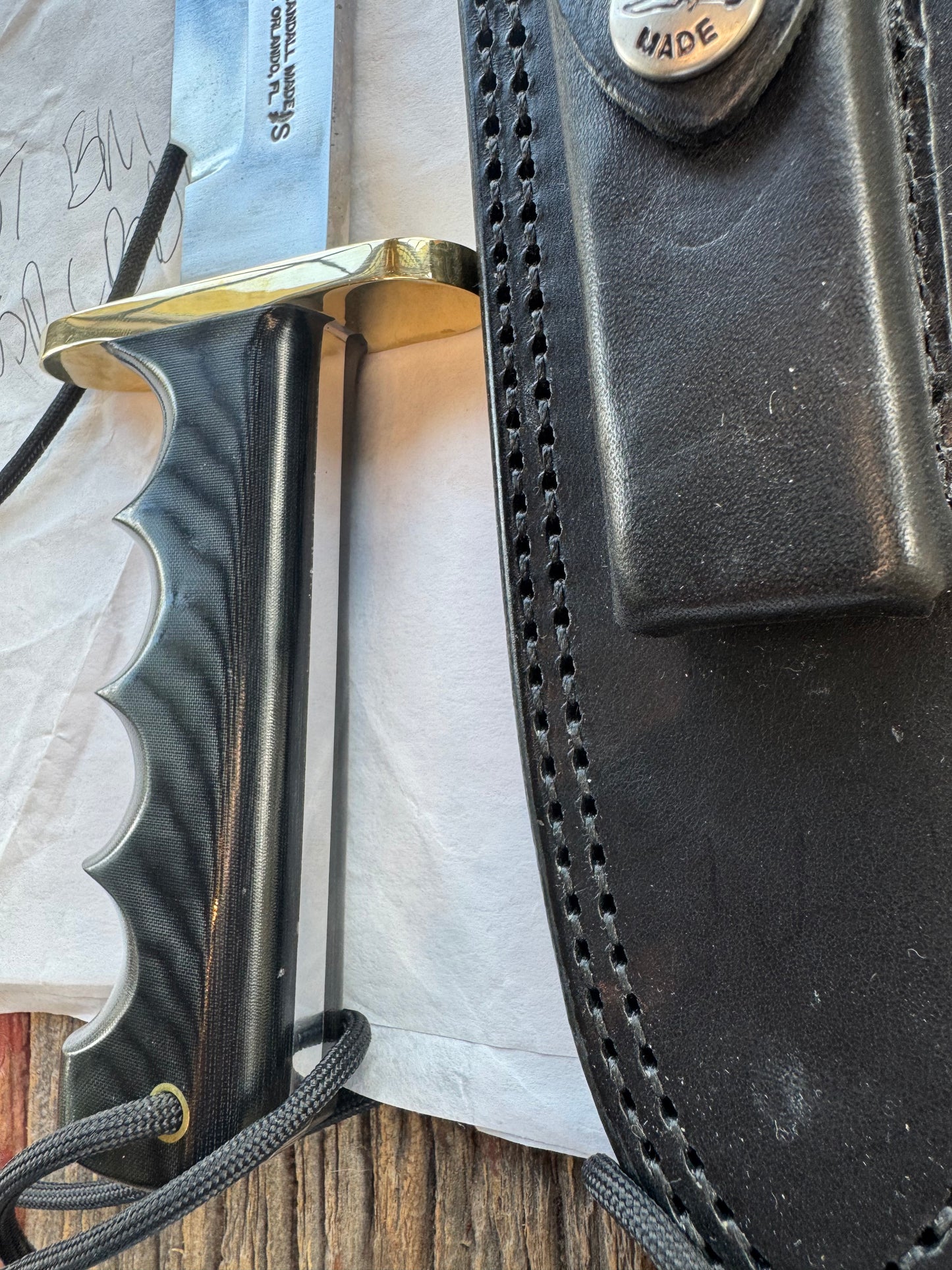 New in Paper Randall Knife Model 14 CDT Black Micarta Brass Hilt Full Tang Stainless, Sawteeth, black sheath.