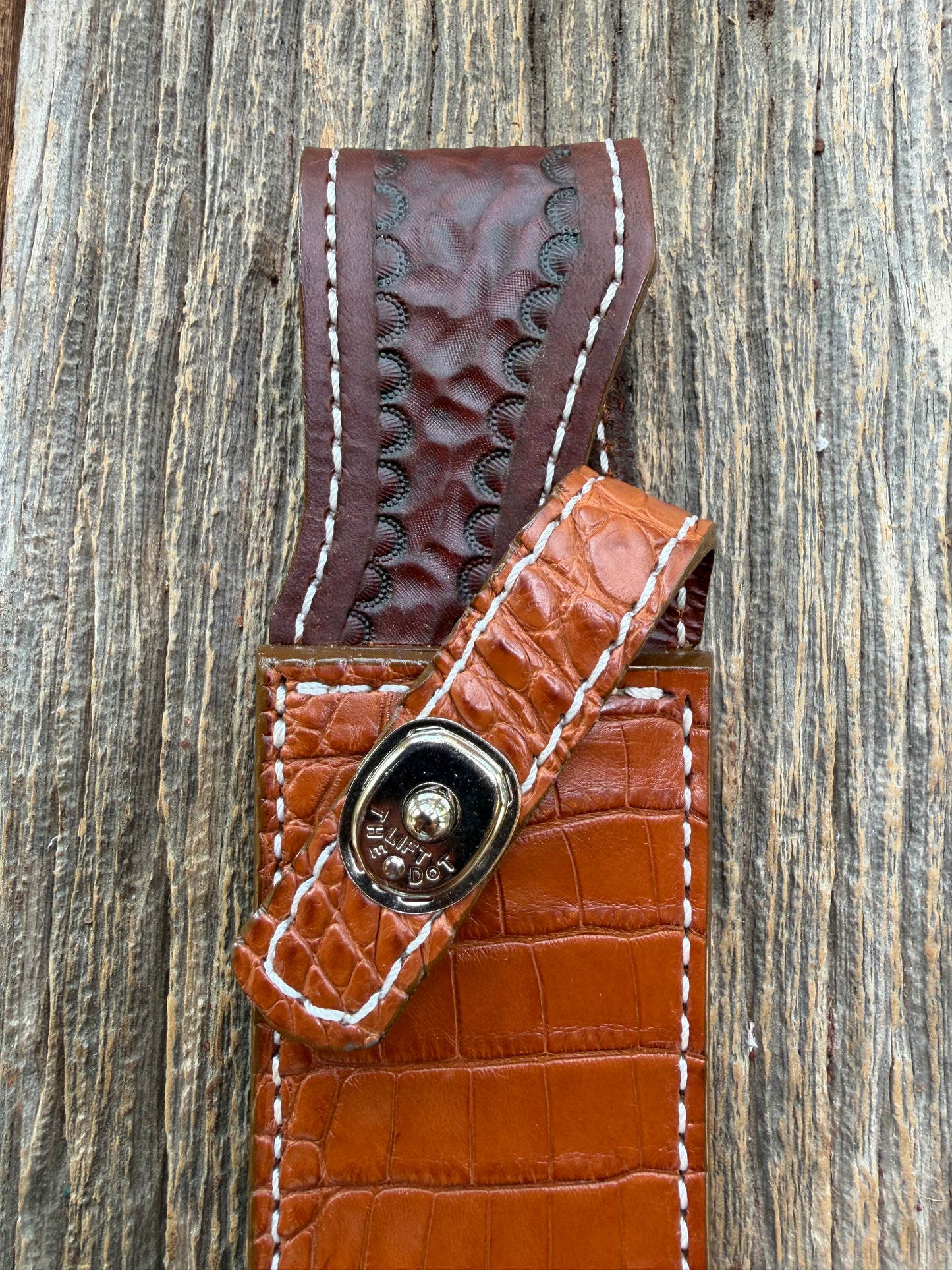 New Randall Model 1-7 Sheath in Exotic thick and textured Honey Crocodile skin on brown leather from Treeman with a silver Canteen snap. Hand tooled belt loop. Killer sheath.