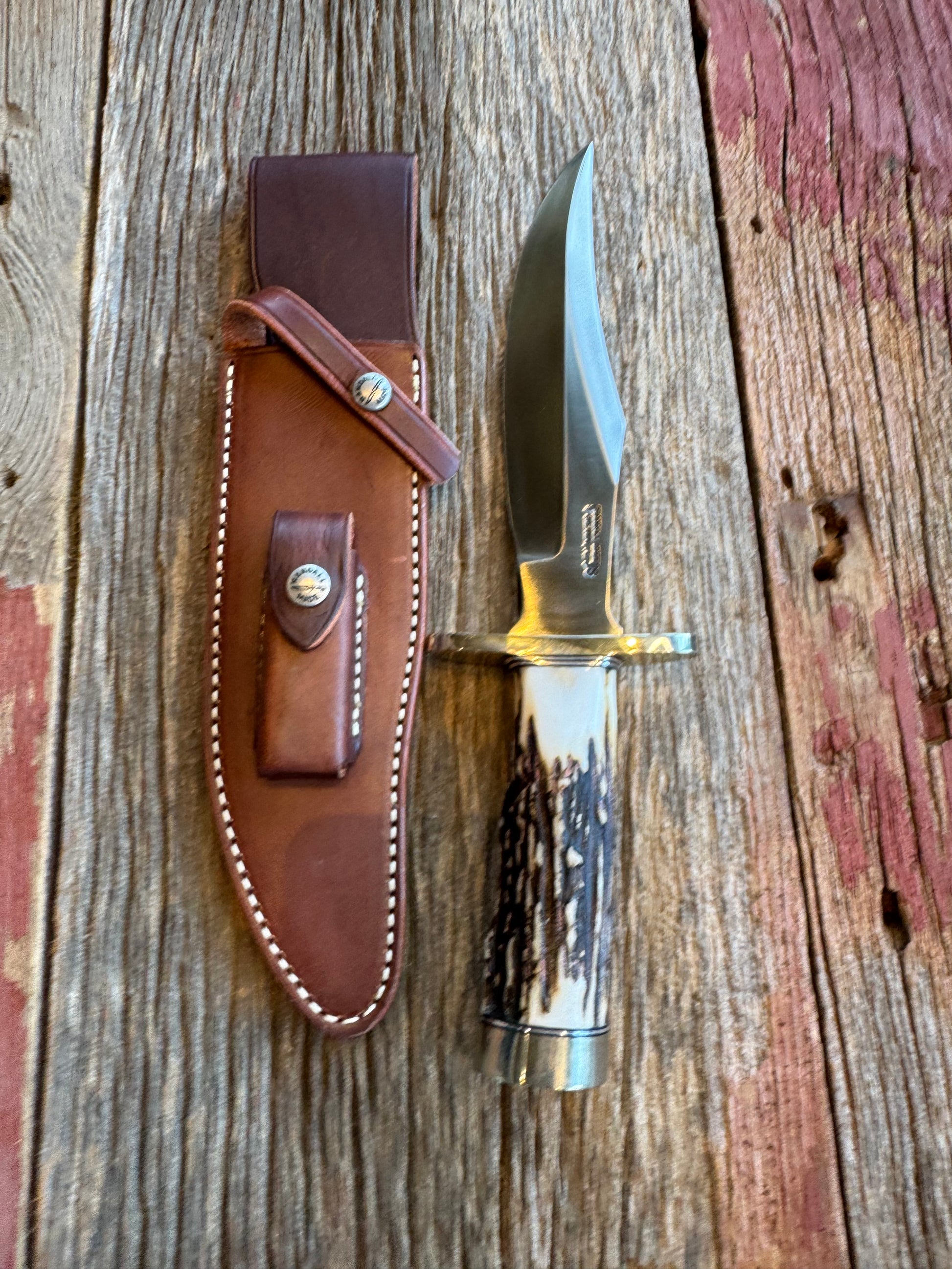 New in paper Randall Knife Model 12-8 “Big Bear” Large piece of Gnarly Popcorn Stag. Nickel silver hilt and butt cap. Stainless steel.