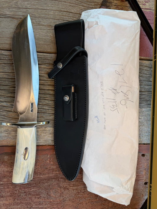 New in Paper Randall Model 12-11 Dealer Special Large Sasquatch Huge piece of Pearly White/Blue Fossil Walrus Ivory, # 1135 Nickel Silver Hilt and butt cap, nickel nameplate.