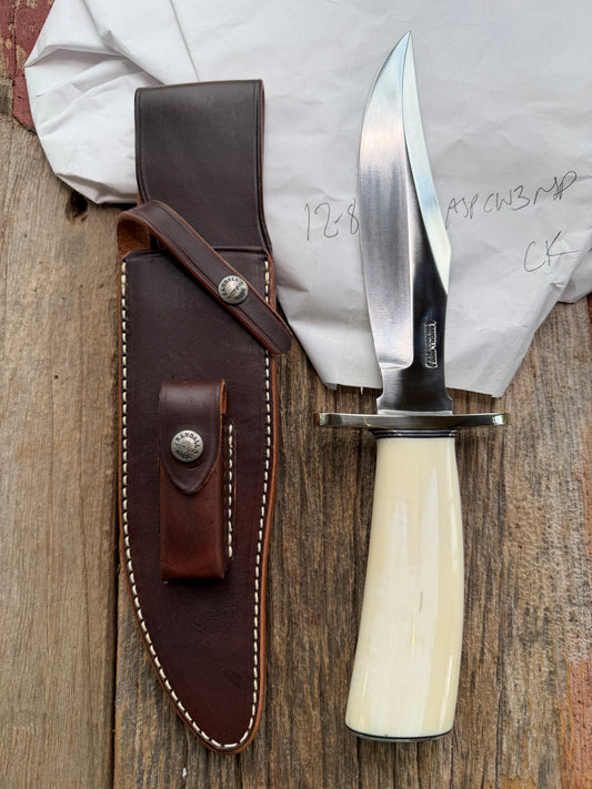 New in paper fresh from the Shop. Randall Knife Model 12-8 Big Bear. Gorgeous piece of creamy Fossil Walrus Ivory. Nickel silver hilt and plate end, Carbon  steel.