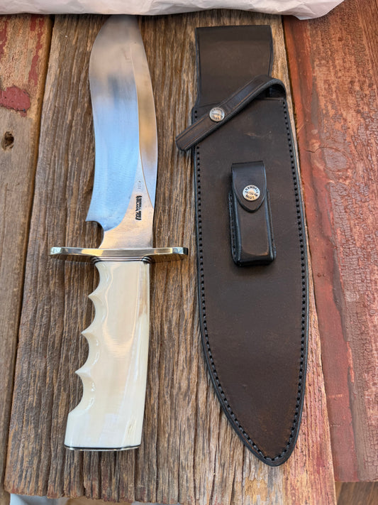New in Paper Randall Model 12-11 Dealer Special Large Sasquatch Huge piece of Pearly White Fossil walrus Ivory, Finger Groves , # 1134 Nickel Silver Hilt and butt cap.
