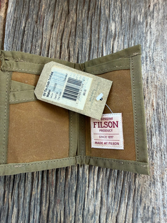 Adding to cart will not result in a sale. Personal Collection..Rare New with Tags Filson Oil Tin Cloth Tri Fold Wallet in Dark Tan # 11069150 from February 2016.