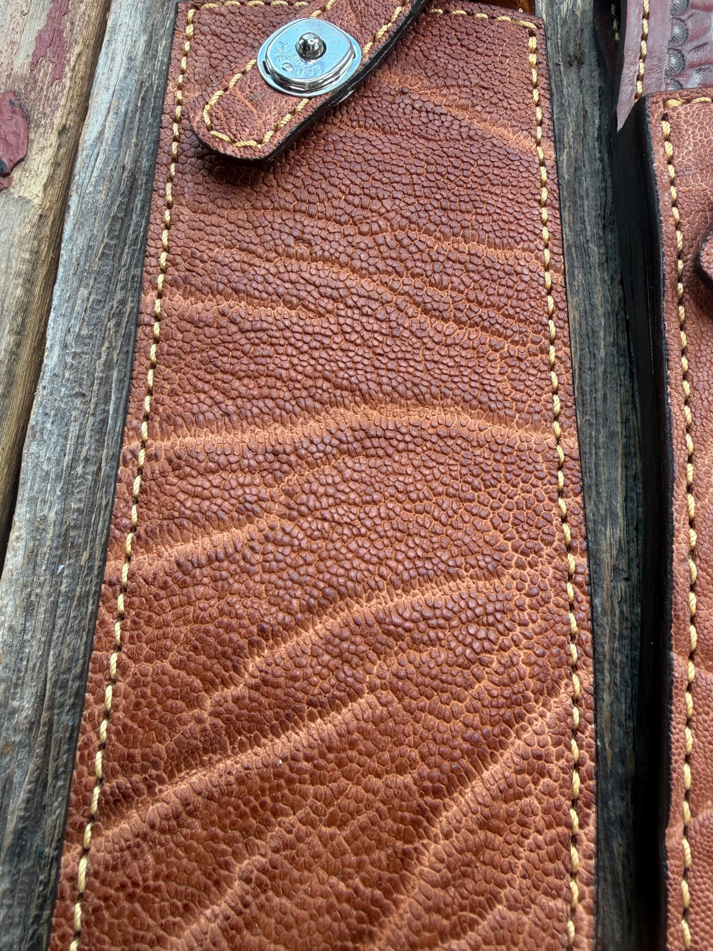 New Randall Model 12-11 Large Sasquatch and 12-8 Small Sasquatch Sheaths in Exotic thick and textured Rust colored Elephant hide on brown leather from Treeman with silver Canteen snaps. Hand tooled belt loop. Killer sheath. Selling as a pair…