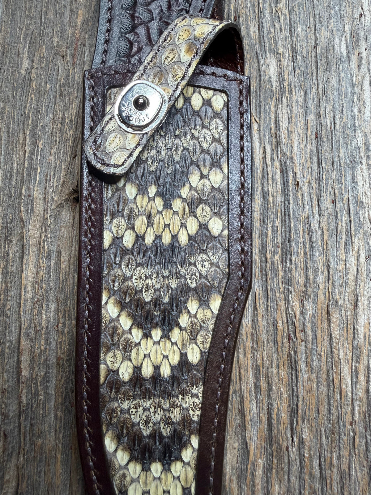 Randall Model 12-8 sheath with an Eastern Diamondback RattleSnake skin from Treeman Sheaths. Hand tooled belt loop, canteen snap. Vibrant colors and one of the hardest skins to source.