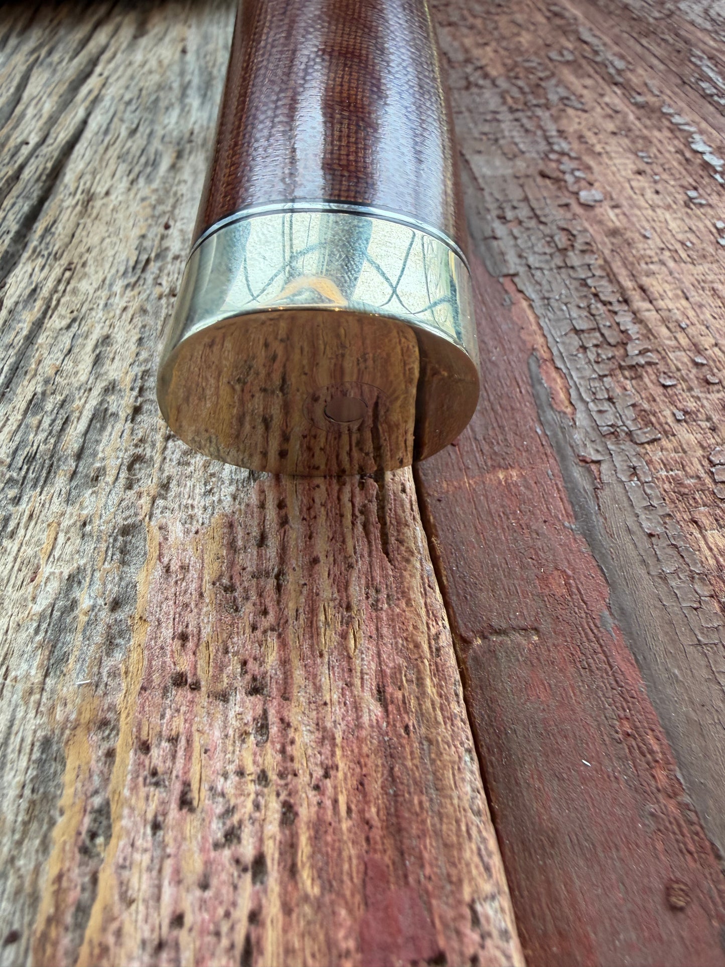 New in Paper Randall Model 19-5 Bushmaster with an Brown Micarta handle. SS blade, Nickel silver single hilt. Lanyard. Brown leather sheath.