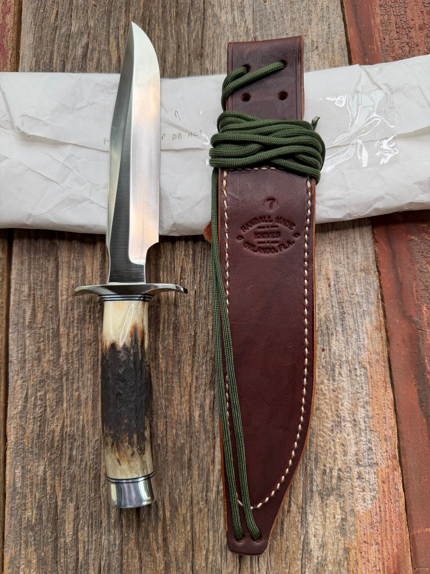 New in Paper Randall Made Knife Model 1-7 Darkened Stag , Stainless, Black and Aluminum spacers, Nickel Silver Hilt, Aluminum butt cap.