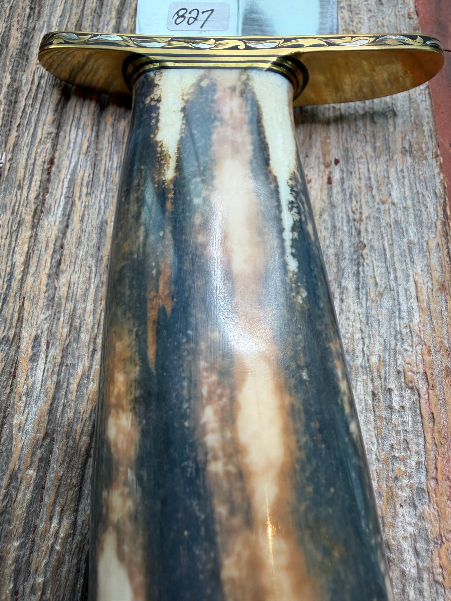 Randall Model 12-11 Smithsonian “Smitty” in a Huge piece of Green, Brown and Blue Fossil Walrus Ivory. Brass Hilt and Brass Butt plate fully engraved in Silver from Jere Davidson.  Stunning piece.