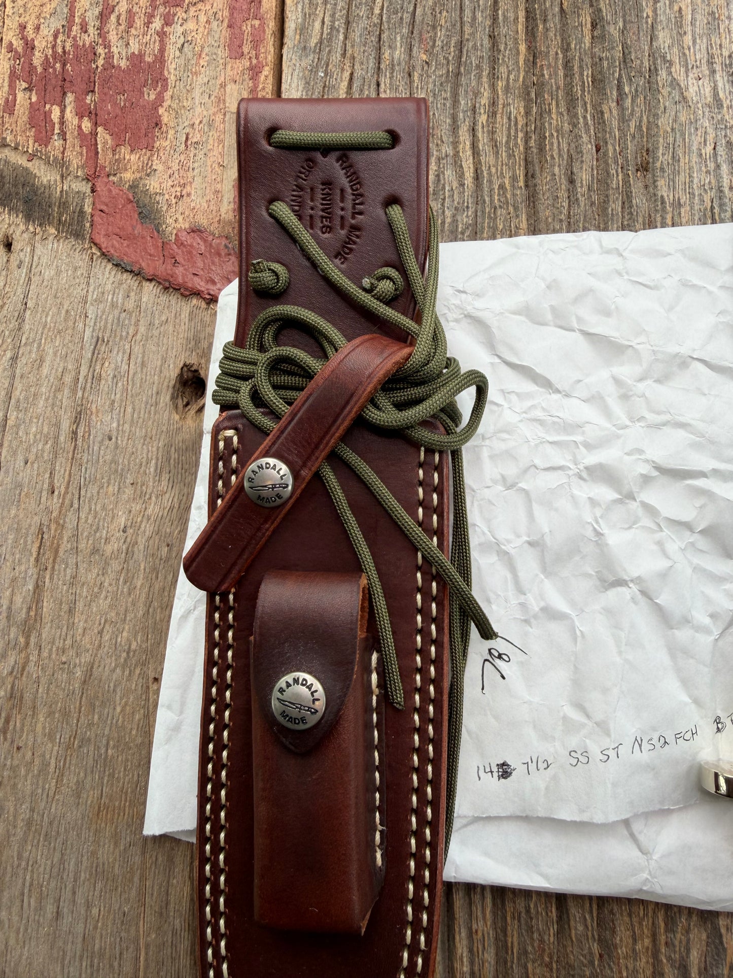 New in Paper Randall Model 14-7.5 in Black Micarta handle, Nickel Silver Hilt, Stainless steel, Sawteeth and Lanyard.