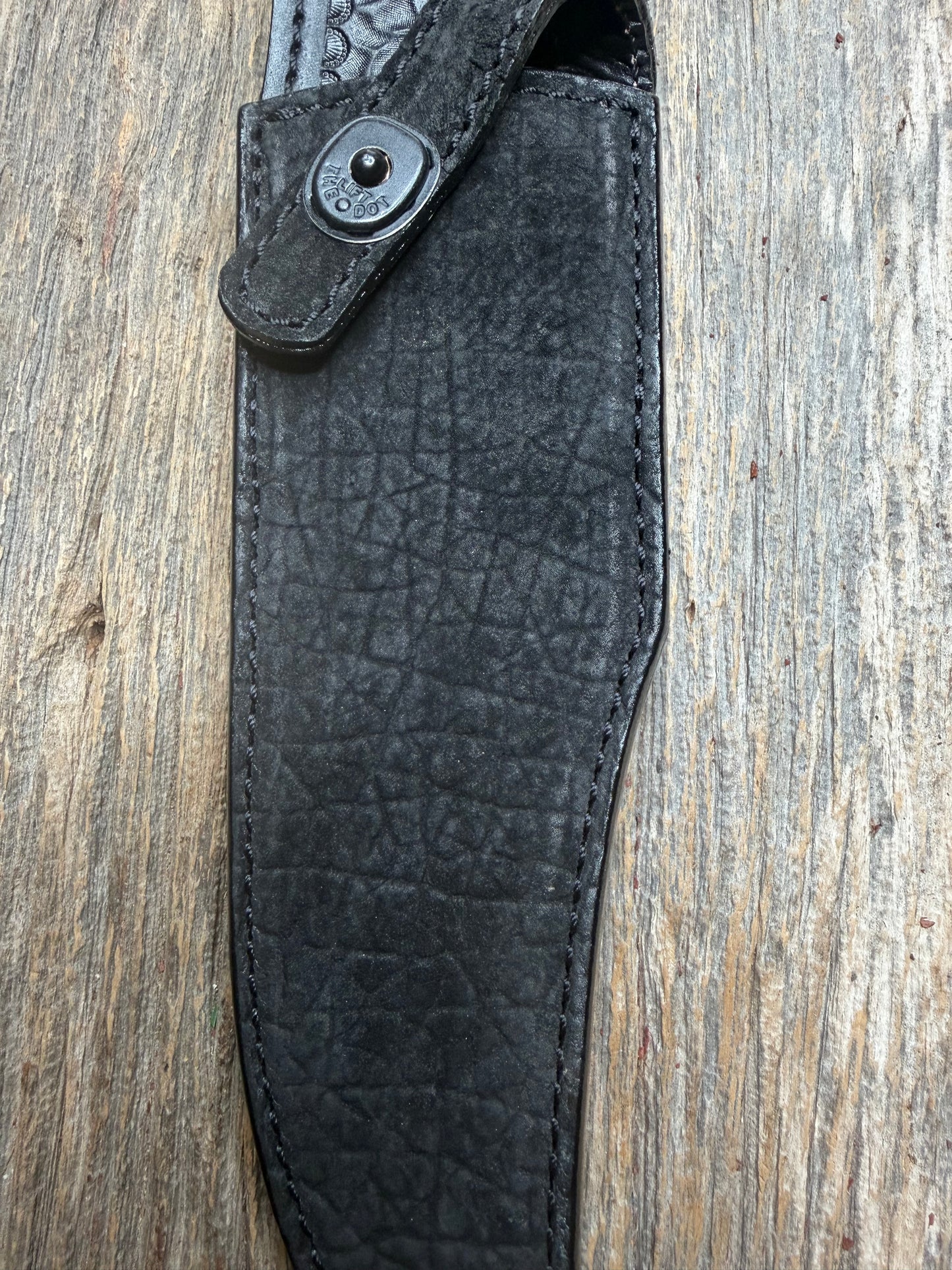Randall Model 12-8 “Big Bear” in Black Hippo, forward curved hilt, black Canteen Snap, full brass stamping and stitching.