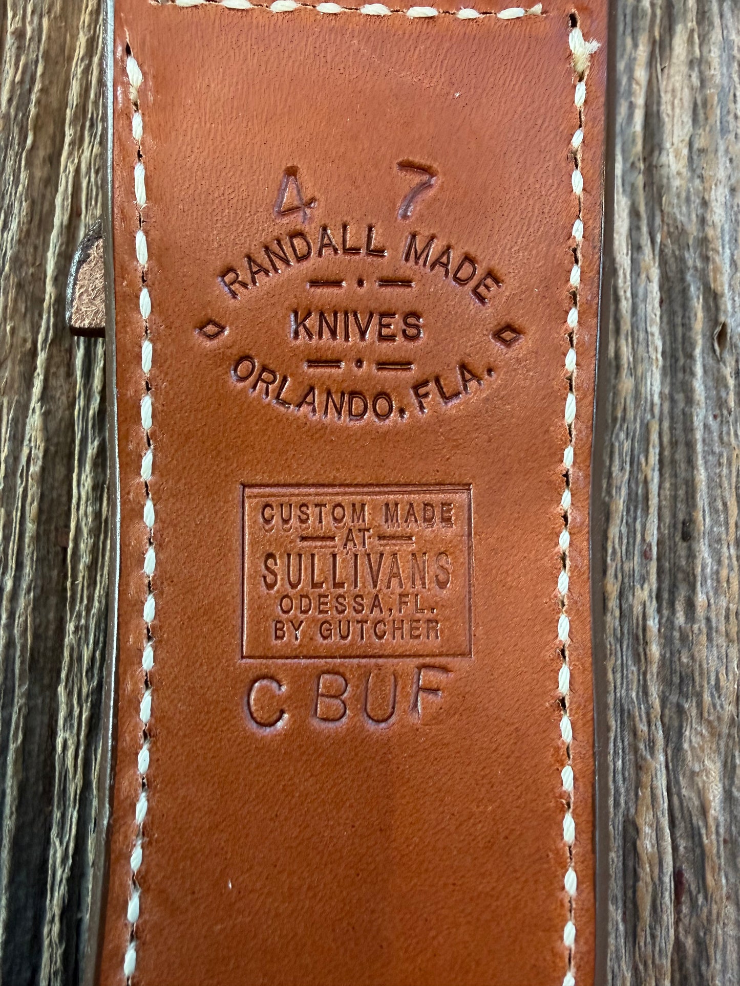 New Randall Model 4-7 Sheath in Exotic Brown Cape Buffalo with full leather hand tooled belt loop. Randall snap and stamp on the back. Custom Made at Sullivan’s by Gutcher