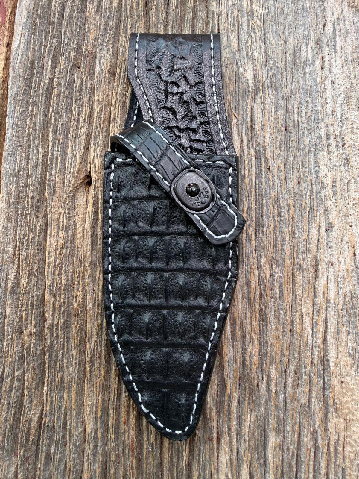 New Randall Model 19-5 Sheath in Exotic Black Matte Crocodile skull from Treeman with a Black Canteen snap. White thread deviated stitching on black leather..Killer sheath.