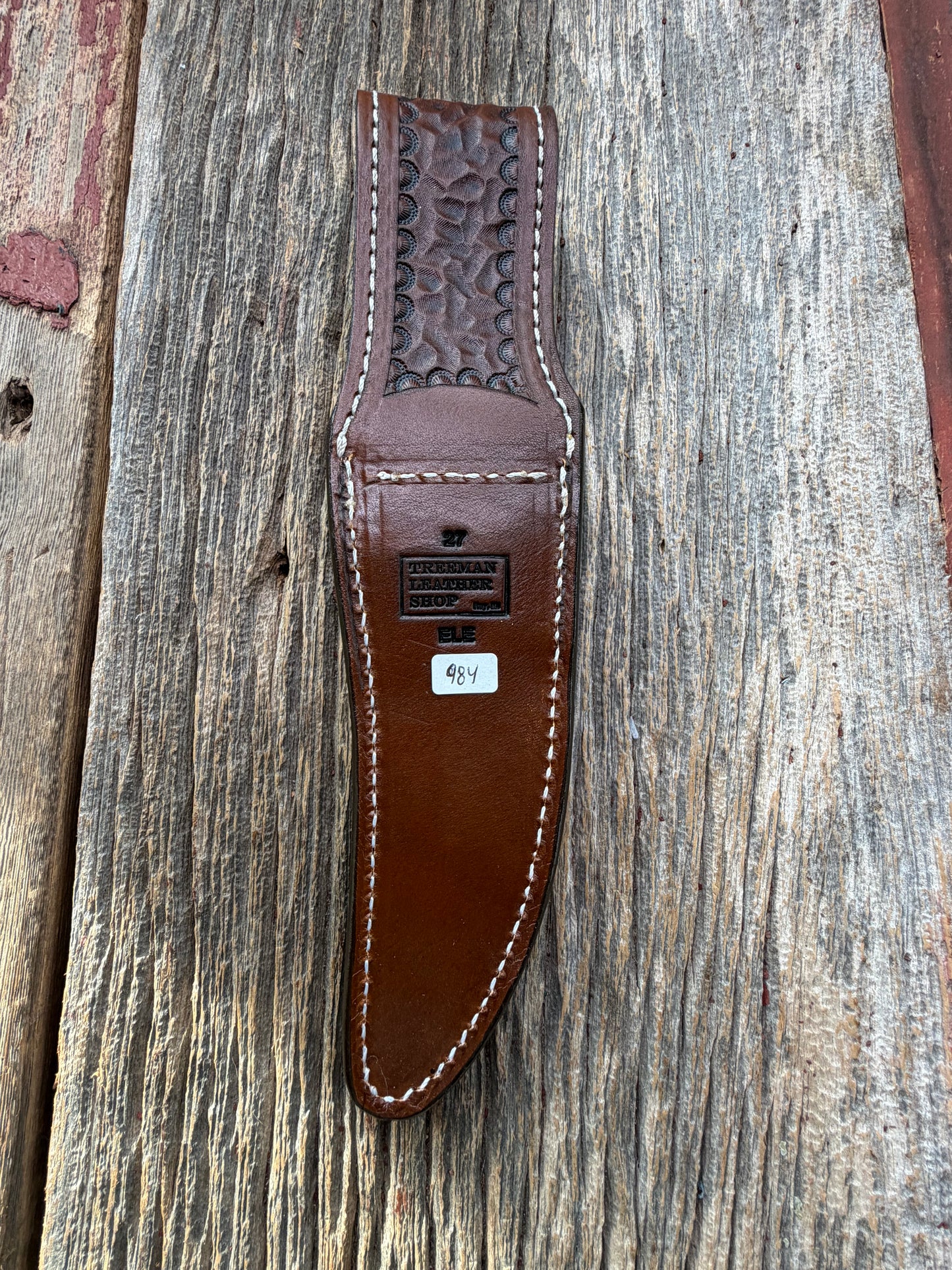 New Randall Model 27 Sheath in Exotic thick and textured Black and Grey Elephant Ear  on brown leather from Treeman with a silver Canteen snap. Hand tooled belt loop. Killer sheath.