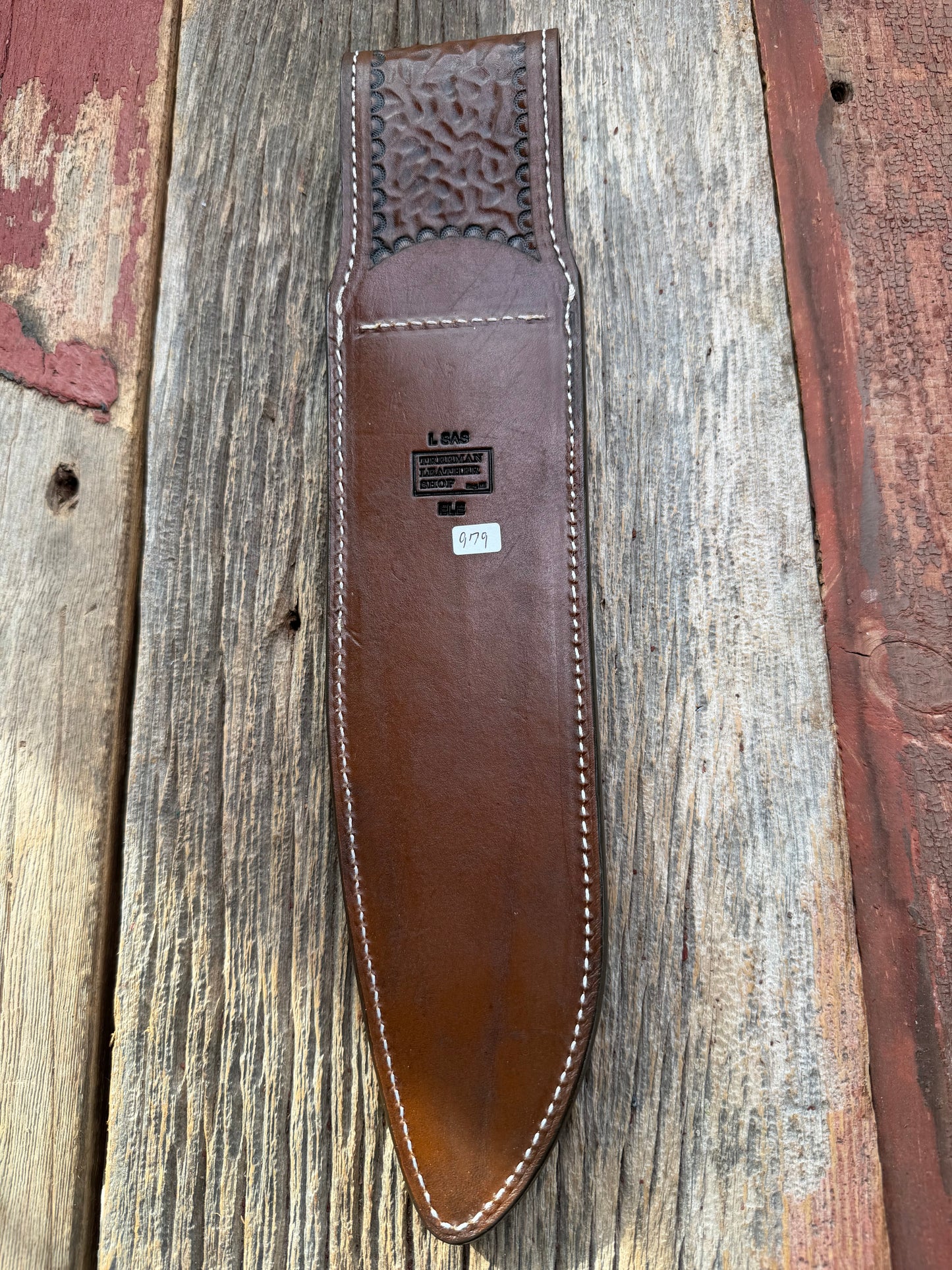 New Randall Model 12-11 Large Sasquatch Sheath in Exotic thick and textured Black and Grey Elephant Ear  on brown leather from Treeman with a black Canteen snap. Hand tooled belt loop. Killer sheath.