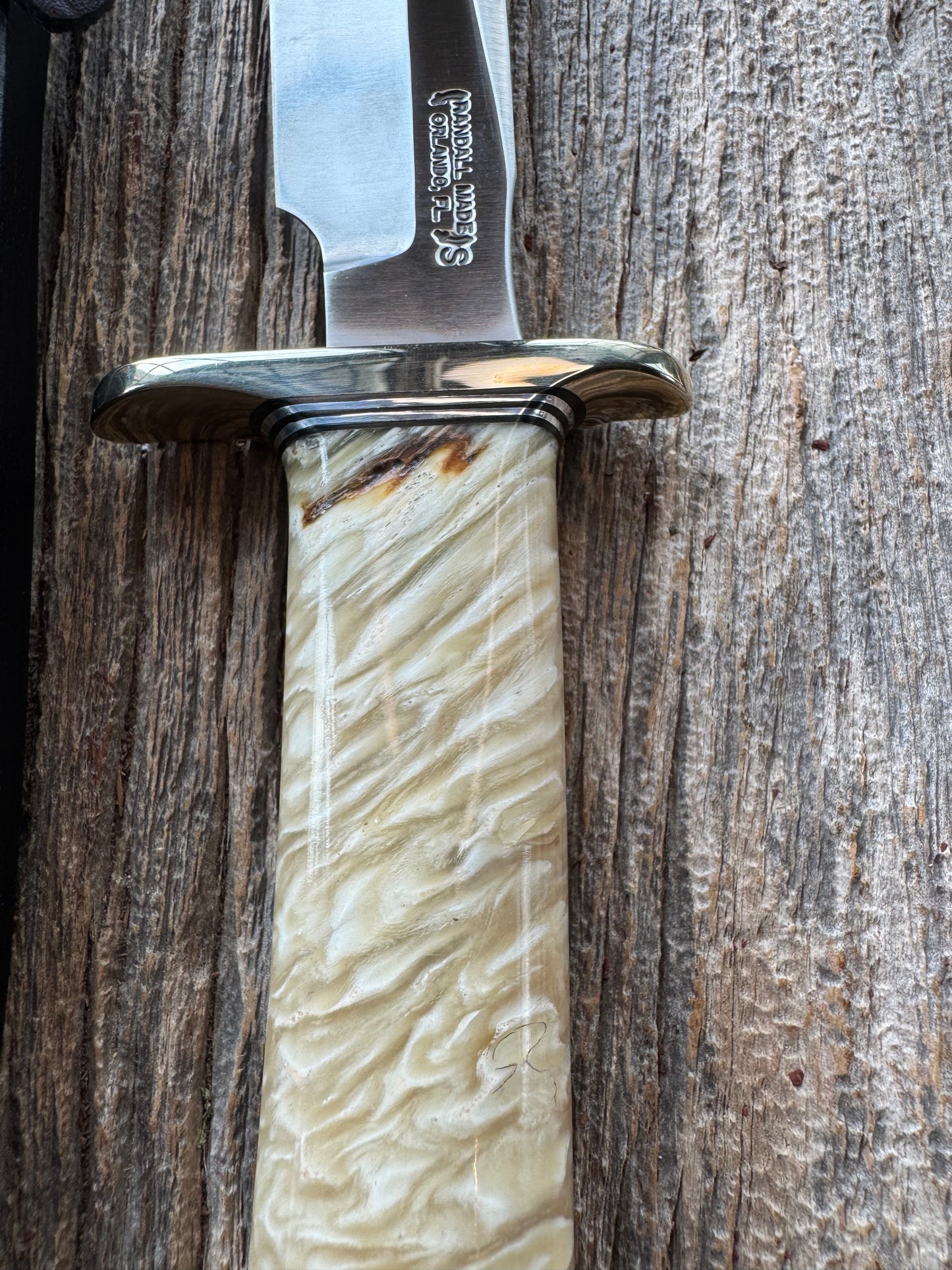 Randall Model 1-7 in Musk Ox. Nickel Silver Hilt and butt plate Black and Aluminum spacers, stainless steel blade.