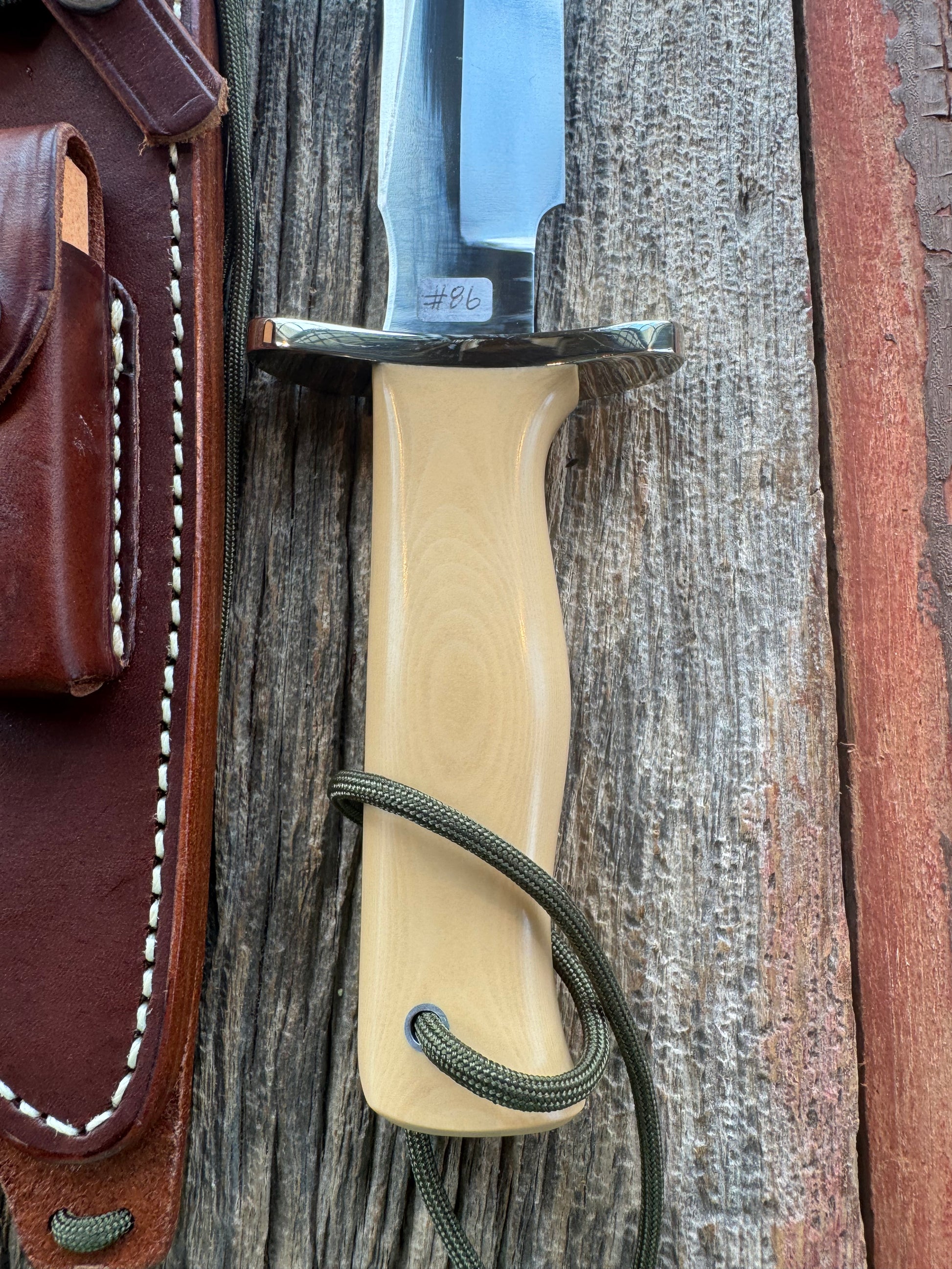 Randall Model 16-7 in Tan Micarta. Nickel Silver Hilt, Stainless steel and Lanyard. New in Paper.