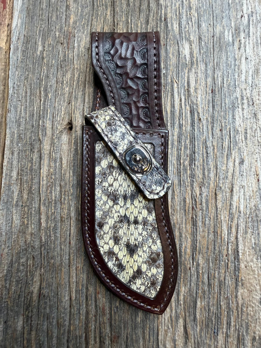 Randall Model Bowles Special sheath with an Eastern Diamondback RattleSnake skin from Treeman Sheaths. Hand tooled belt loop, canteen snap. Vibrant colors and one of the hardest skins to source.