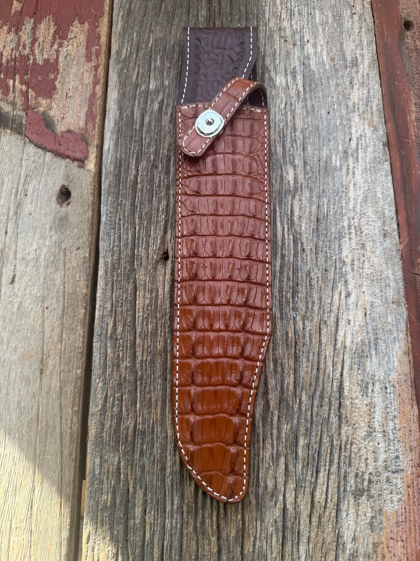 New Randall Model 12-11 Confederate Sheath in Exotic thick and textured Honey Crocodile skin ( Hornback) on brown leather from Treeman with a silver Canteen snap. Hand tooled belt loop. Killer sheath.