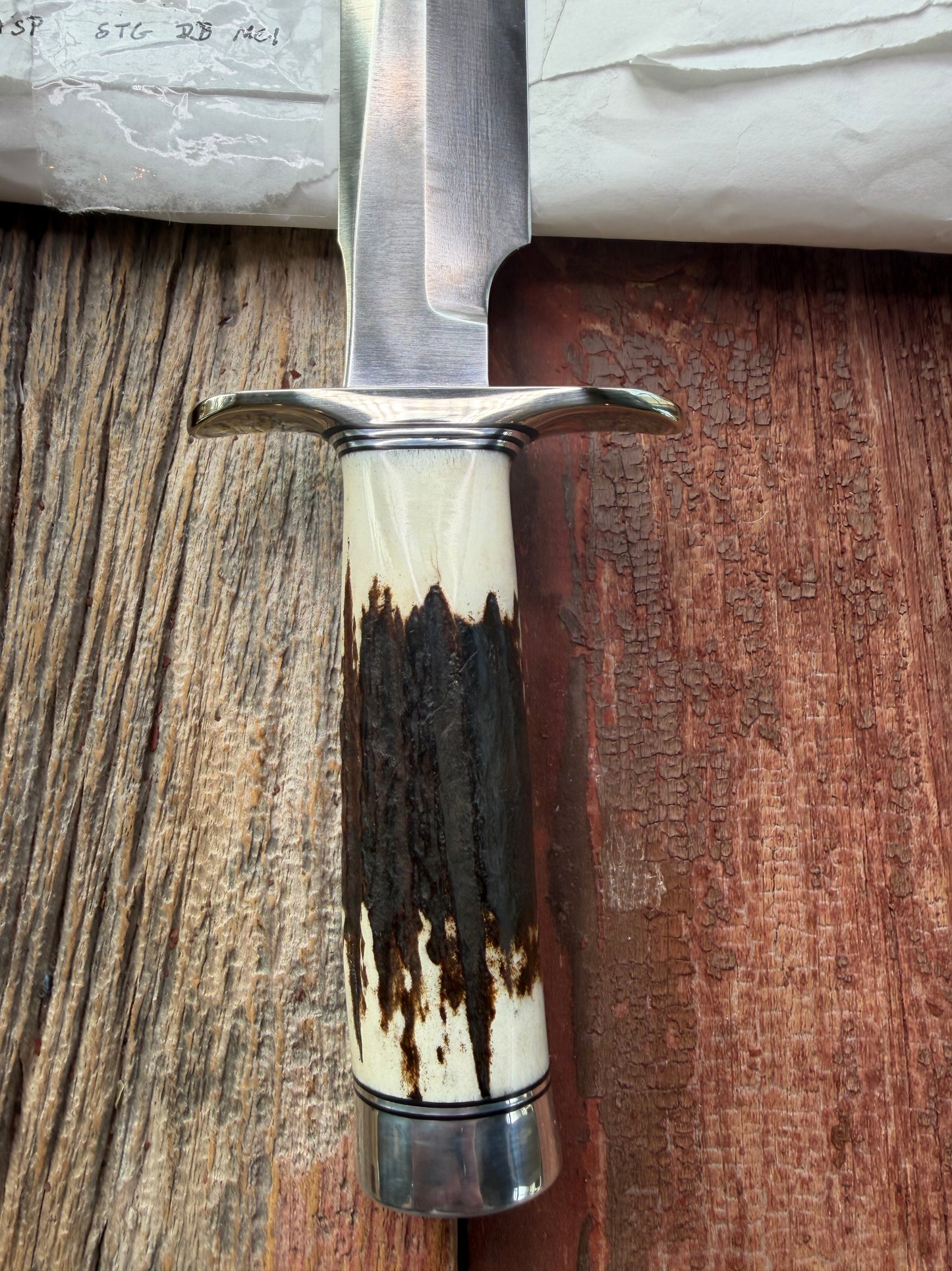 New in Paper Randall Made Knife Model 1-8 Stag , Stainless, Black and Aluminum spacers, Nickel Silver Hilt, Aluminum butt cap.
