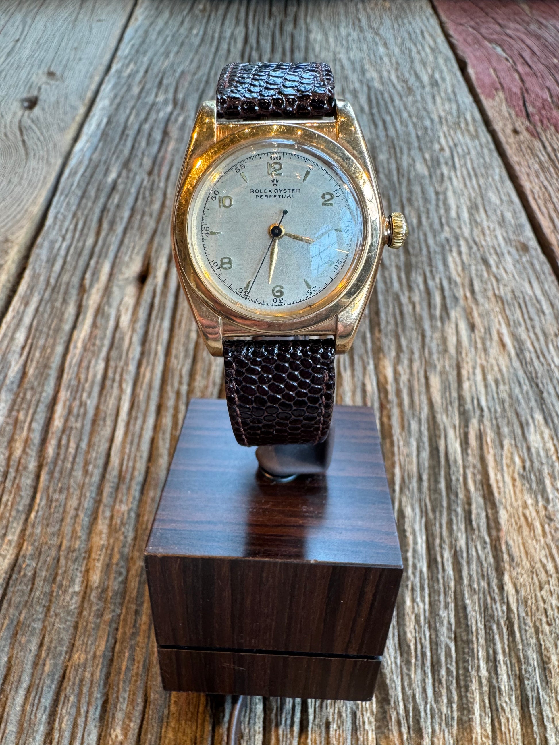 Vintage Rolex Oyster Perpetual Bubble Back circa 1940-1942 Rose Gold case with cream dial. Hirsch Lizard 18mm strap. No box or papers.