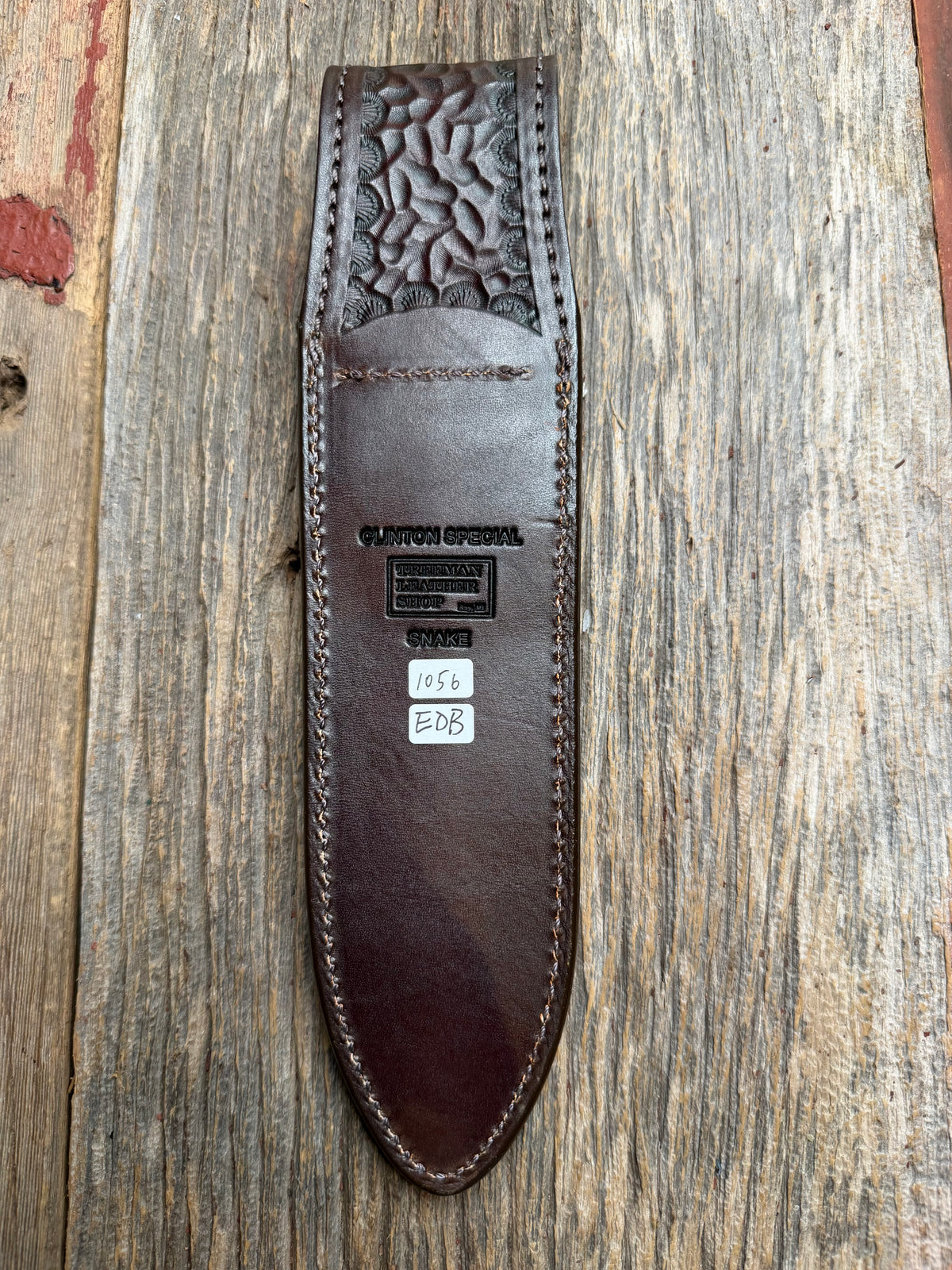 Randall Model Clinton Special sheath with an Eastern Diamondback RattleSnake skin from Treeman Sheaths. Hand tooled belt loop, canteen snap. Vibrant colors and one of the hardest skins to source.