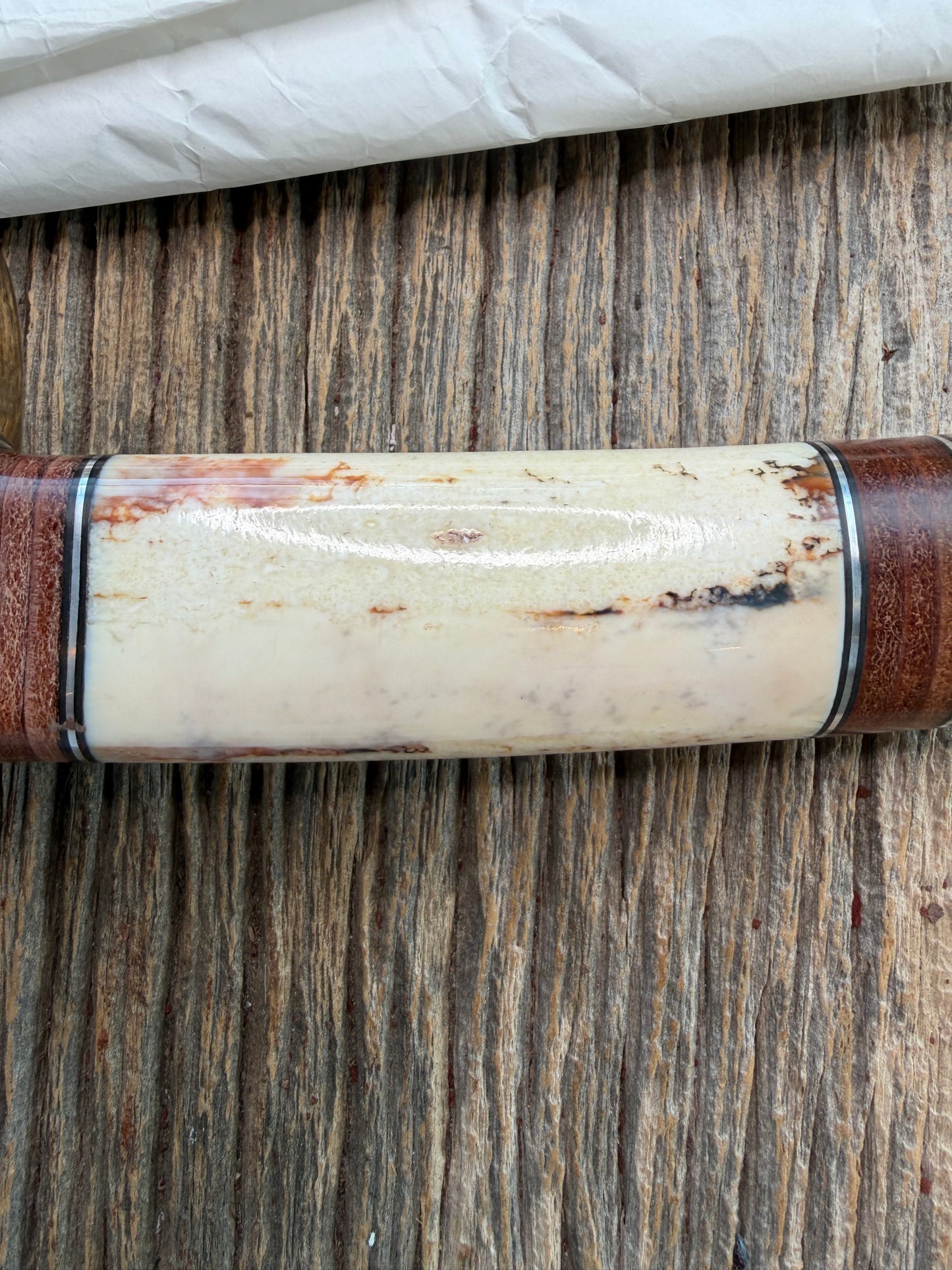 New in Paper Randall Model 12-9 Fossil Walrus Ivory and 25 style stacked Leather grip. Double Nickel Silver hilt and nickel butt cap.