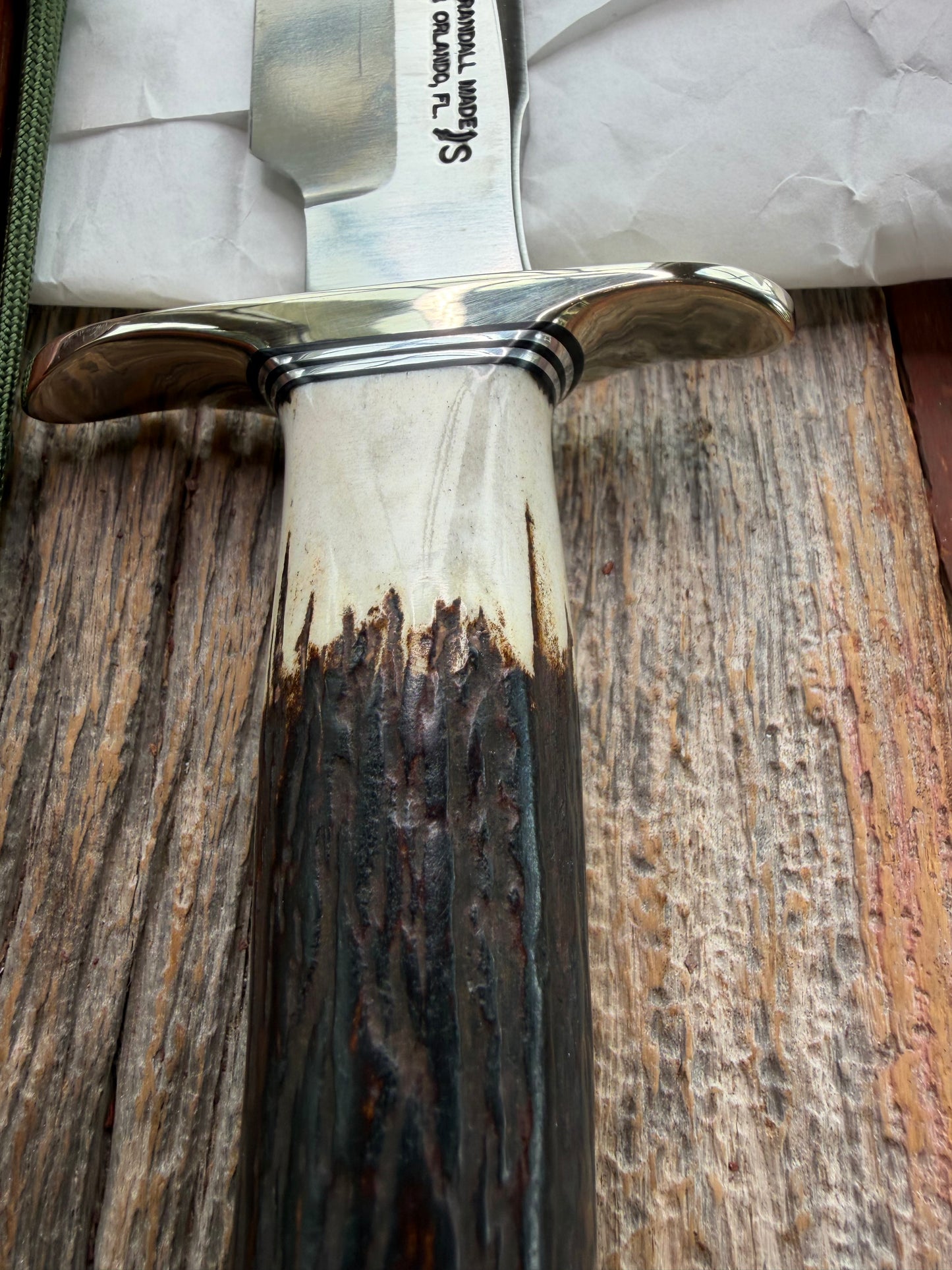 New in Paper Randall Made Knife Model 1-8 Stag , Stainless, Black and Aluminum spacers, Nickel Silver Hilt, Aluminum butt cap.