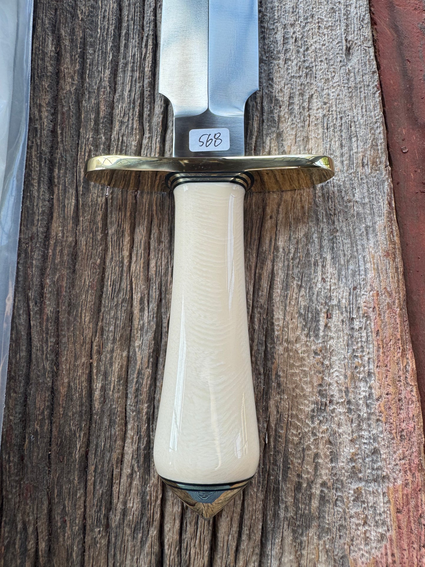 New in paper Randall Clinton Special with a nice piece of customer supplied Warthers Resin with concave grip, Stainless Steel, Brass Hilt and brass coolie cap.