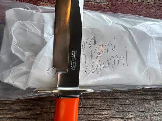 New in paper Randall Model 14 CDT with a nice piece of customer supplied Orange G10. Stainless Steel, Nickel Silver Hilt and Butt cap.