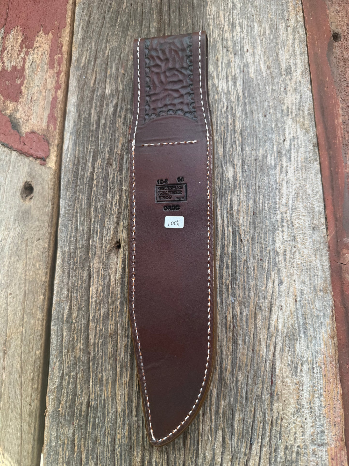 New Randall Model 12-9/14 Grind Sheath in Exotic thick and textured Honey Crocodile skin on brown leather from Treeman with a silver Canteen snap. Hand tooled belt loop. Killer sheath.