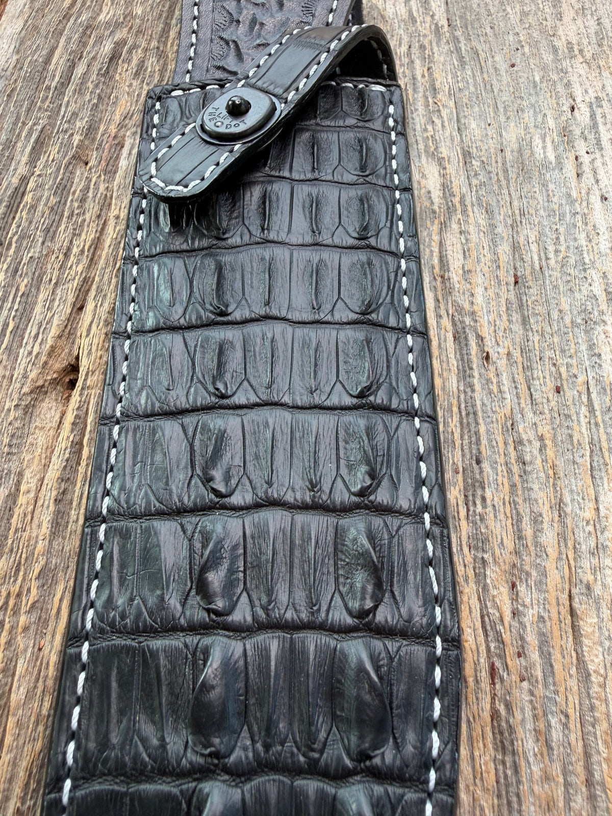 New Randall Model 12-9 Sheath in Exotic Black Matte Crocodile tail from Treeman with a Black Canteen snap. White thread deviated stitching on black leather..Killer sheath.