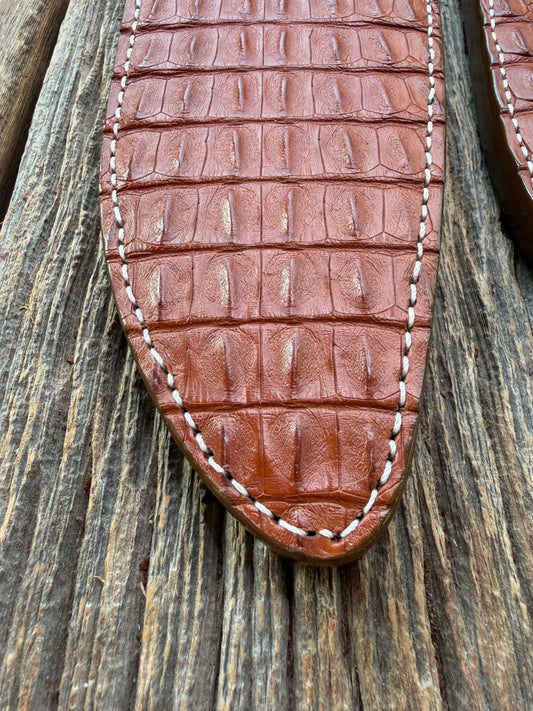 Pair of new Randall Model 12-11 Large and Small Sasquatch Sheaths in Exotic thick and textured Honey Crocodile skin ( skull portion) on brown leather from Treeman with a silver Canteen snap. Hand tooled belt loop. Killer sheath.