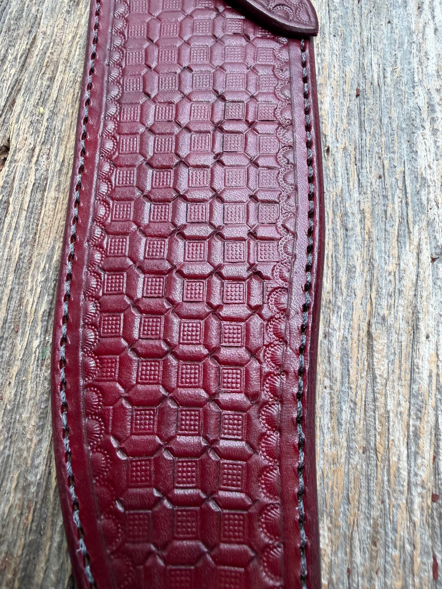 Randall Model 12-8 “Big Bear” sheath in Ox Blood Red stamped leather from Sullivans by Gutcher. Parquet window pattern, mesmerizing !!