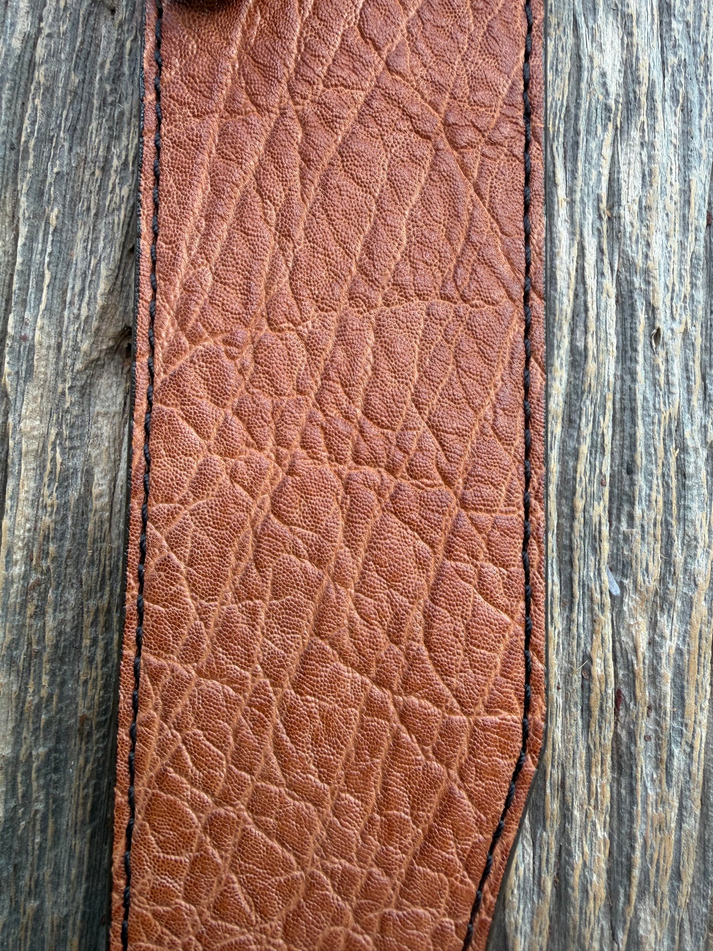 New Randall Model 12-11 Confederate Sheath in Exotic thick and textured Rust colored Elephant hide on brown leather from Treeman with a black Canteen snap. Hand tooled belt loop. Killer sheath.