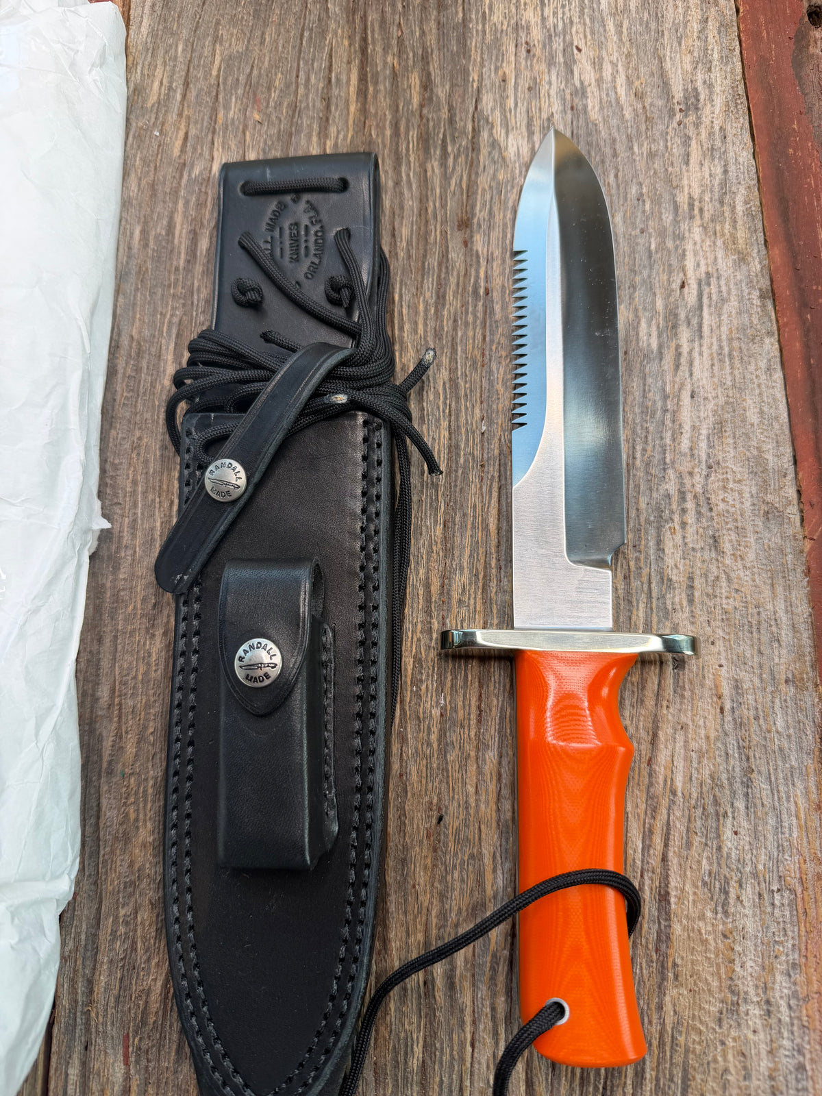 New in Paper Randall Model 14-7.5 with an Orange G10 Micarta Handle. Single Finger grip, SS, Black Sheath, Lanyard and Sawteeth.