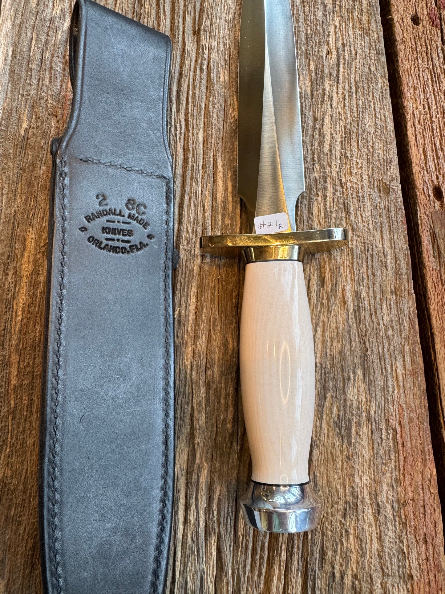 New Randall Knife Model 2-8 Warther Resin Ivory. Nickel Silver Hilt plus collar. Stainless Steel Blade, flanged butt cap.