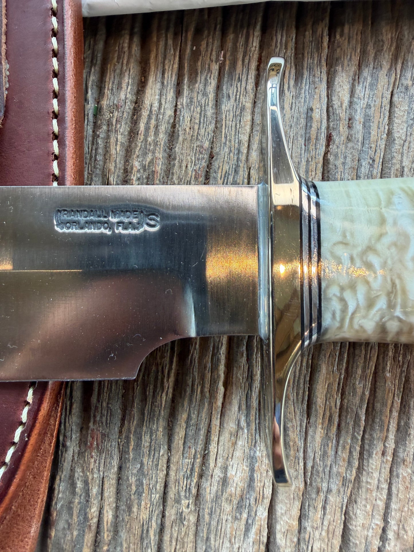 New in Butchers paper Randall Model 12-9/14 Grind with a Huge piece of Musk Ox. Nickel Silver Hilt and raw natural end.