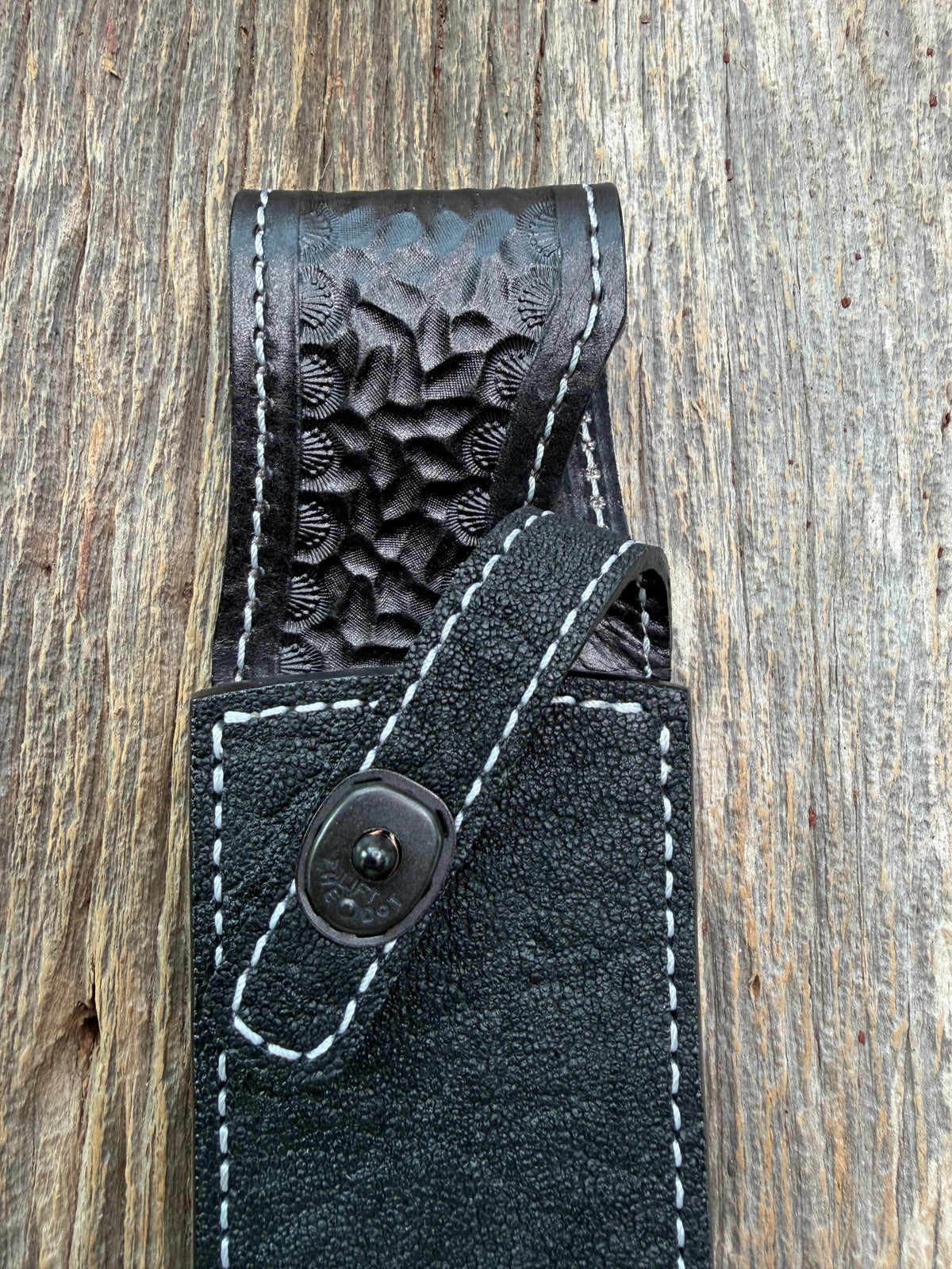 New Randall Model 12-8 Sheath in Exotic Black Matte Elephant Hide from Treeman with a Black Canteen snap. White thread deviated stitching on black leather..Killer sheath.