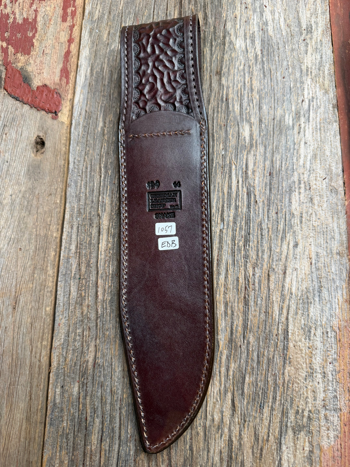Randall Model 12-9 sheath with an Eastern Diamondback RattleSnake skin from Treeman Sheaths. Hand tooled belt loop, canteen snap. Vibrant colors and one of the hardest skins to source.