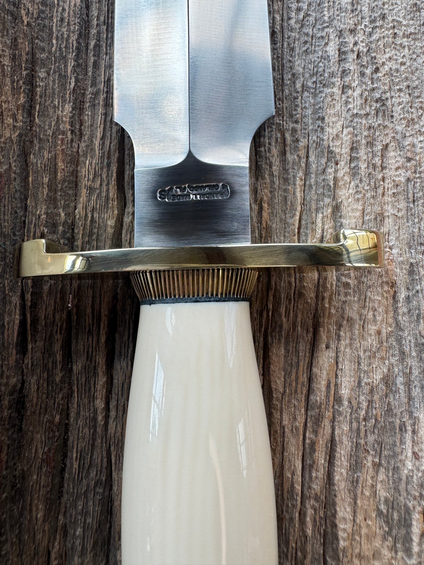 New in paper Randall Clinton Special with a nice piece of customer supplied Warthers Resin with a Stainless Steel blade, lugged Brass Hilt, brass scalloped butt cap and collar.