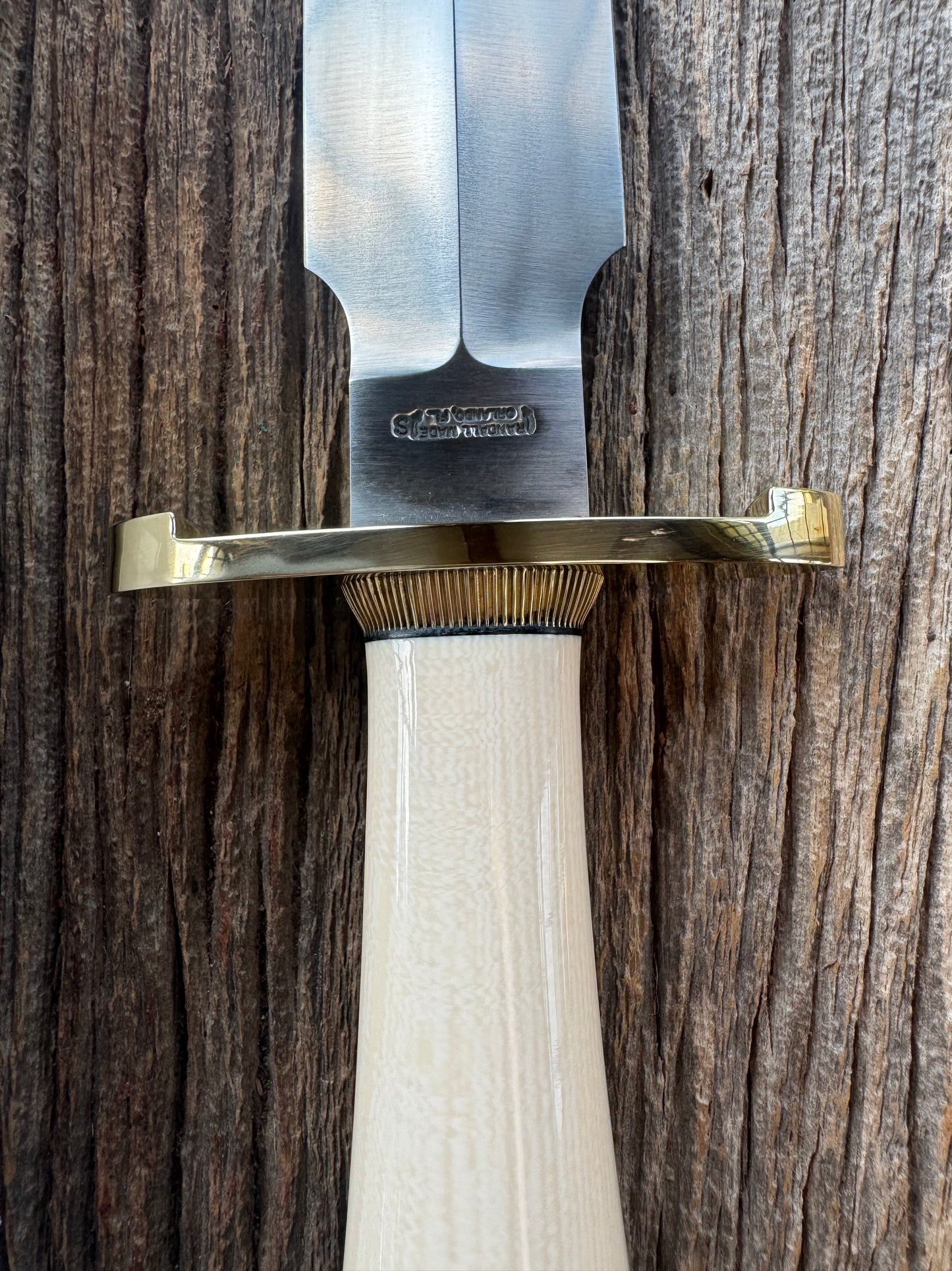 New in paper Randall Clinton Special with a nice piece of customer supplied Warthers Resin with concave grip, Stainless Steel, Brass Lugged Hilt and brass scalloped coolie cap.