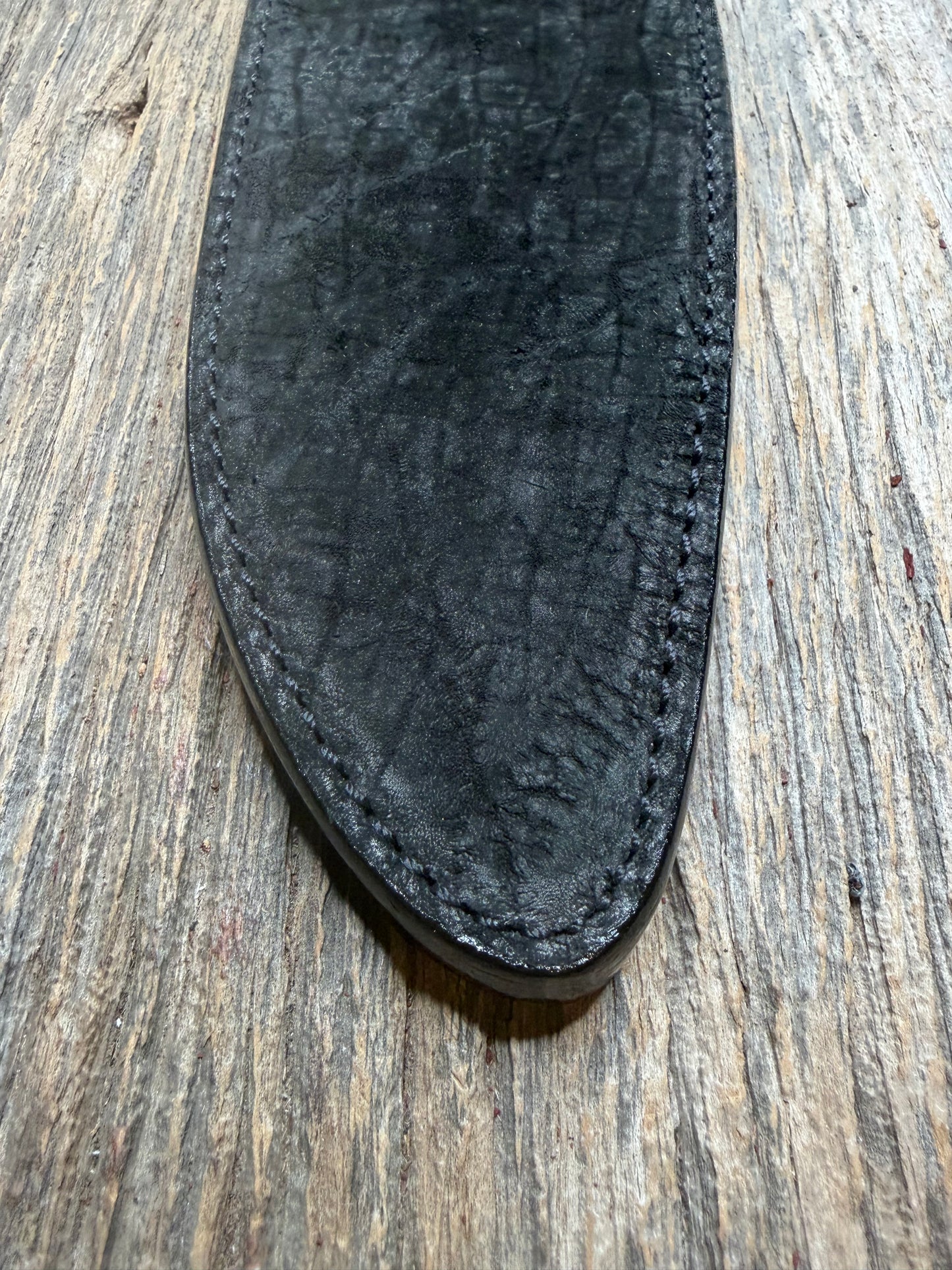 Randall Model 12-11 Large Sasquatch in Black Hippo, forward curved hilt, black Canteen Snap, full brass stamping and stitching.
