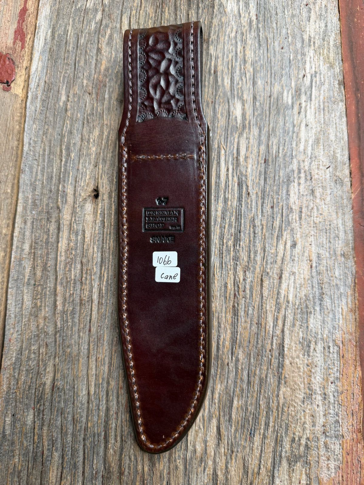 Randall Model 1-7 sheath with a Canebrake RattleSnake skin from Treeman Sheaths. Vibrant colors and along side Copperheads the hardest skin to source.