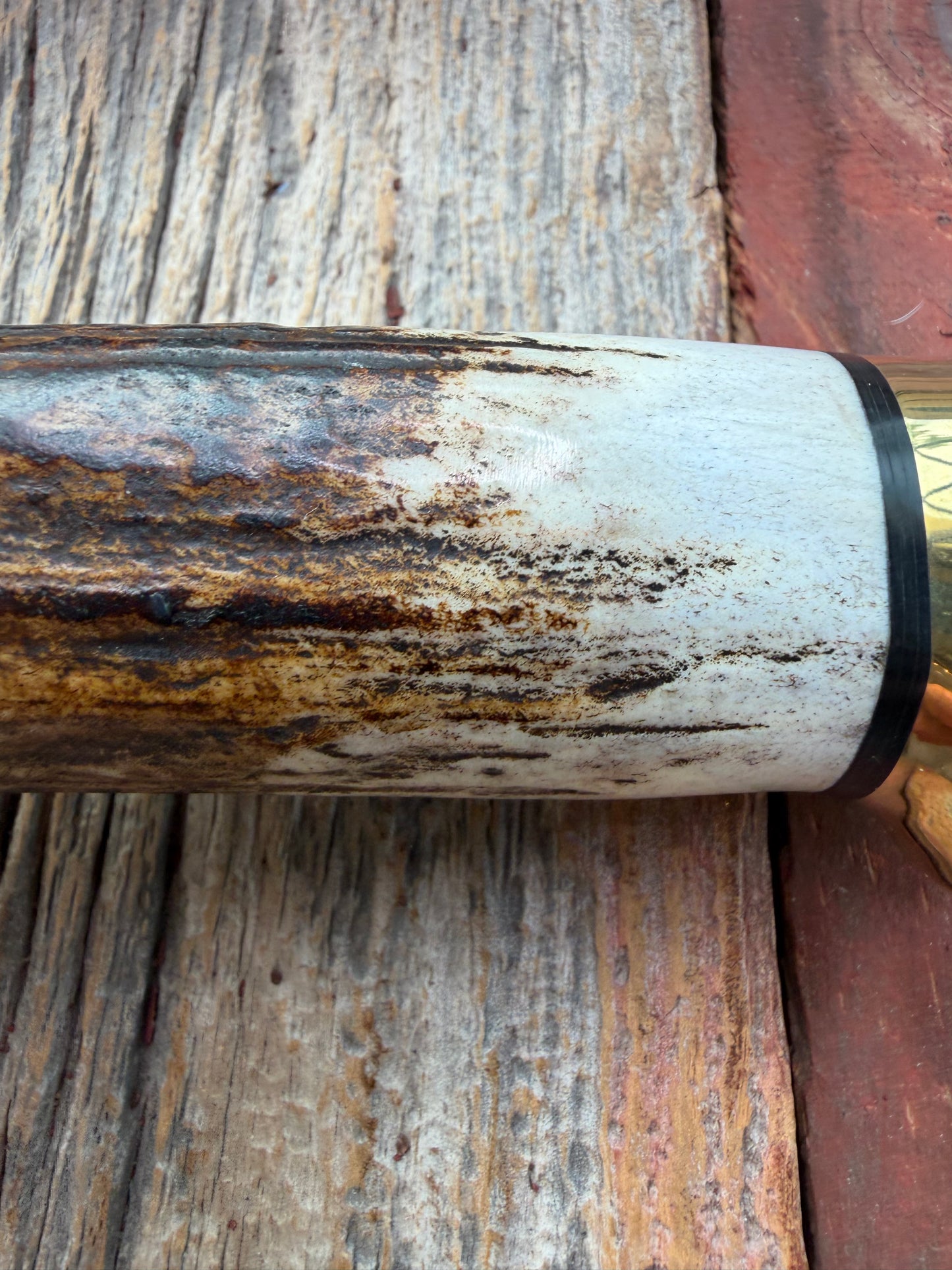 New in paper fresh from the Shop. Randall Knife Model 14-7.5 Big. Nice piece of Stag, Gorgeous Brass Lugged hilt and brass crows beak butt cap. Single black spacer. Stainless steel.