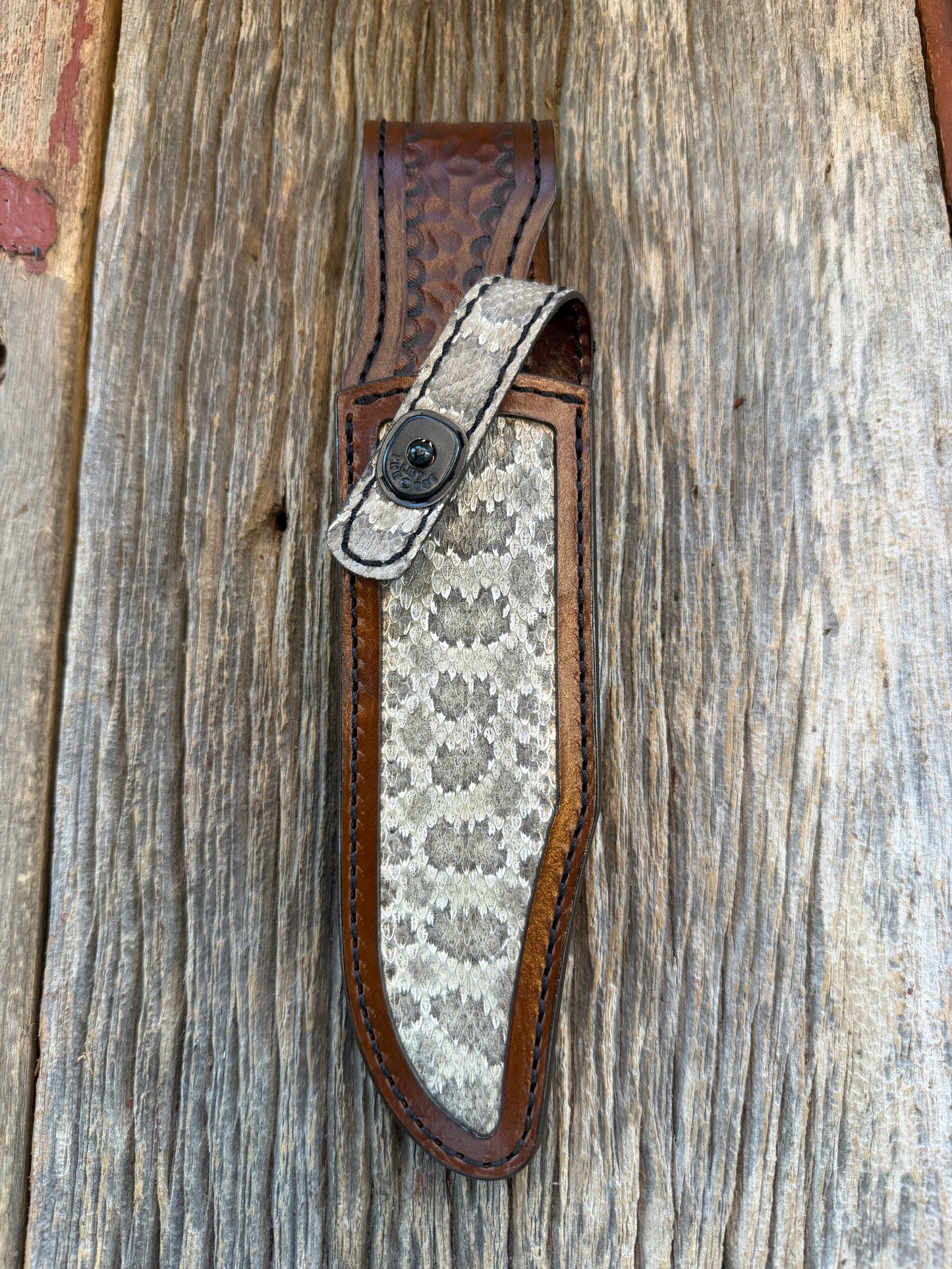 Randall Model Buxton Fighter Special Sheath in Exotic Prairie RattleSnake from Treeman Sheaths. Tremendous colors on this one.