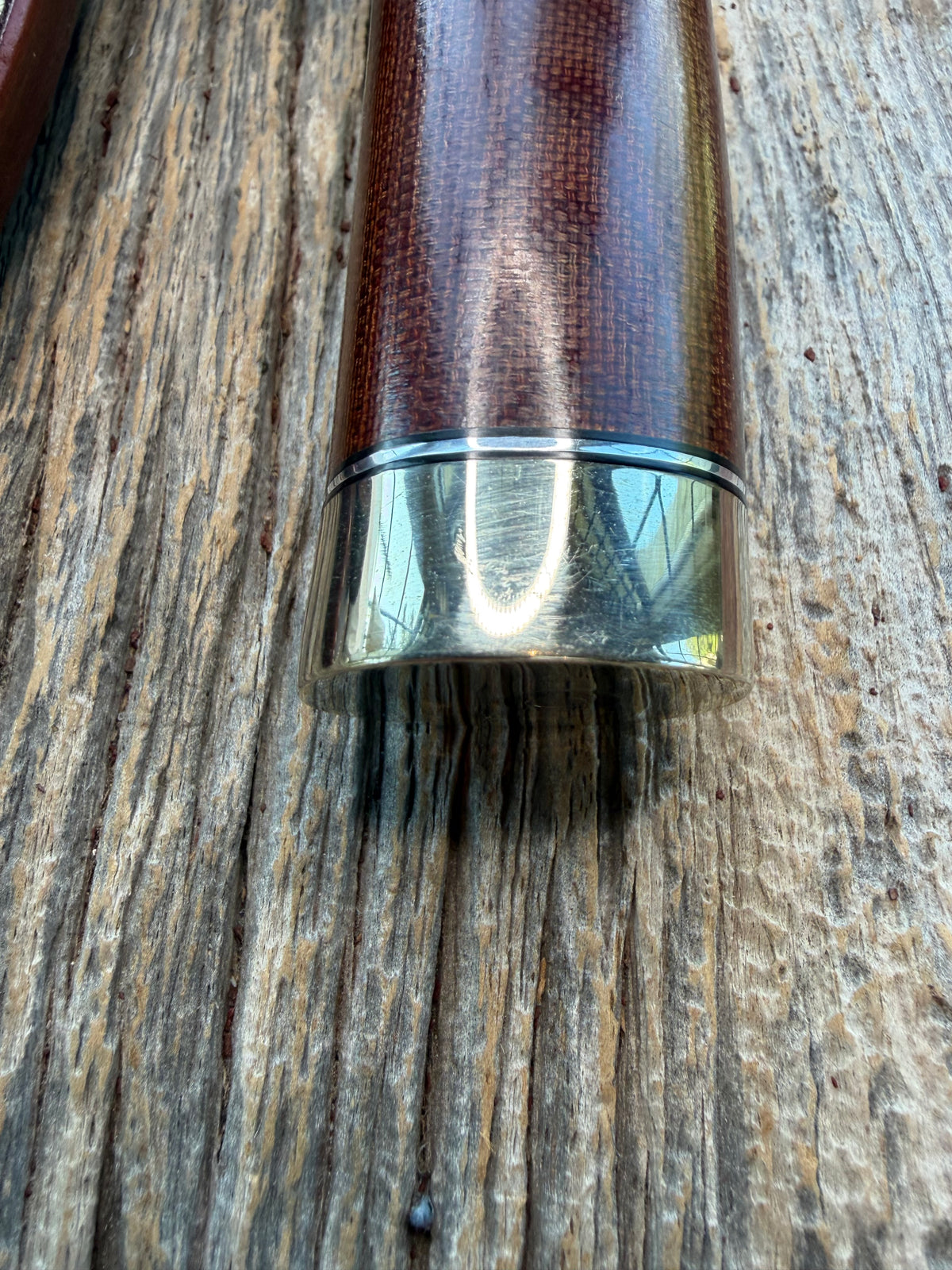 New in Paper Randall Model 19-5 with an attractive piece of Brown Micarta. Nickel silver single Hilt and buttcap , Stainless steel. Black and Aluminum spacers.