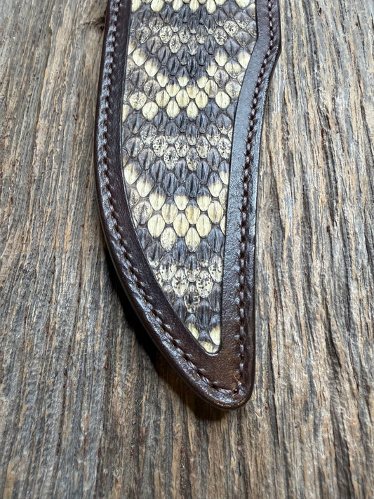 Randall Model 12-8 sheath with an Eastern Diamondback RattleSnake skin from Treeman Sheaths. Hand tooled belt loop, canteen snap. Vibrant colors and one of the hardest skins to source.