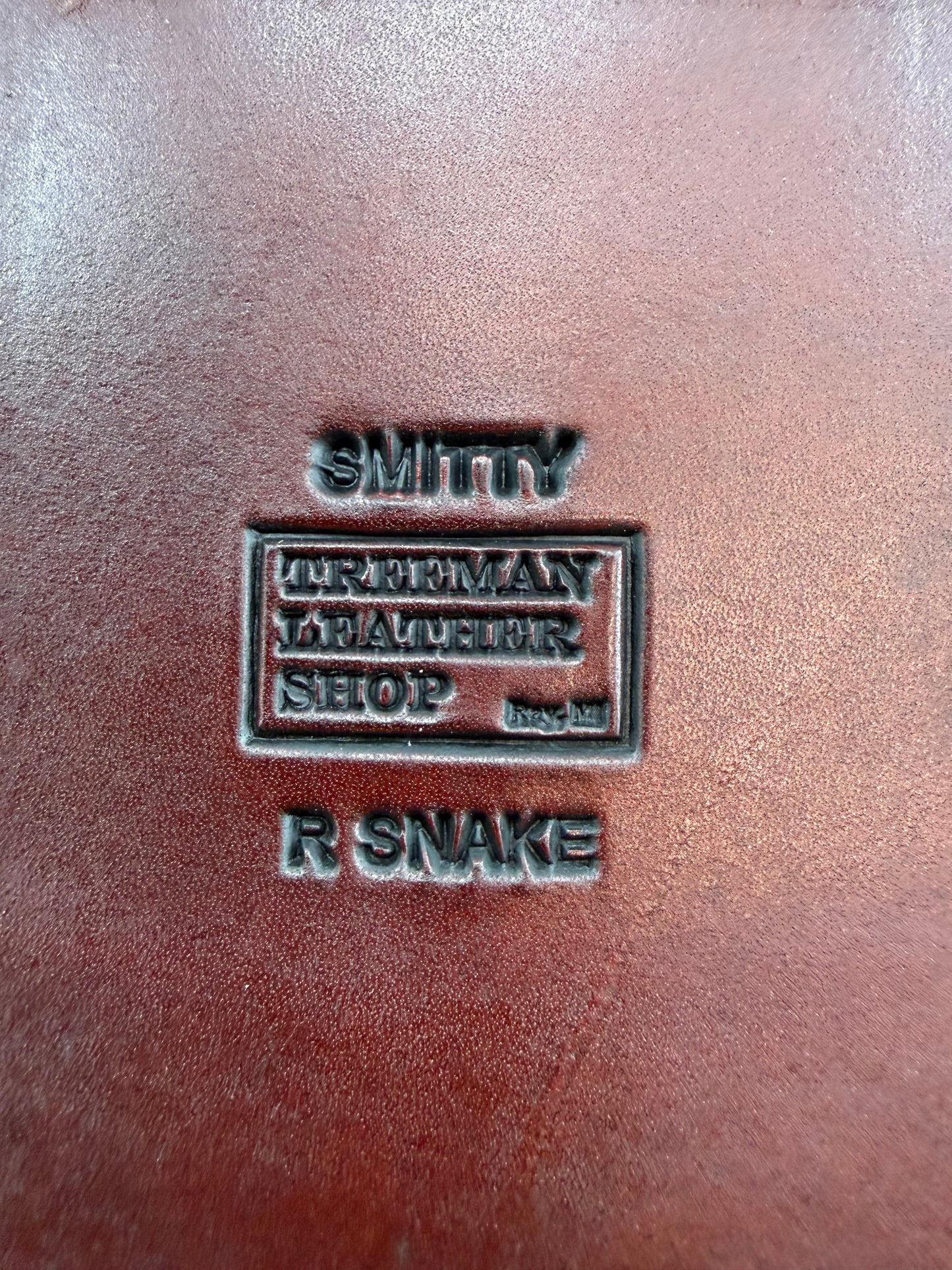 Randall Model 12-11 Smitty Sheath in Exotic Canebreak RattleSnake with the original Rattles tail made into the strap. An absolute gem 1/1 from Treeman Sheaths. Tremendous colors on this one.