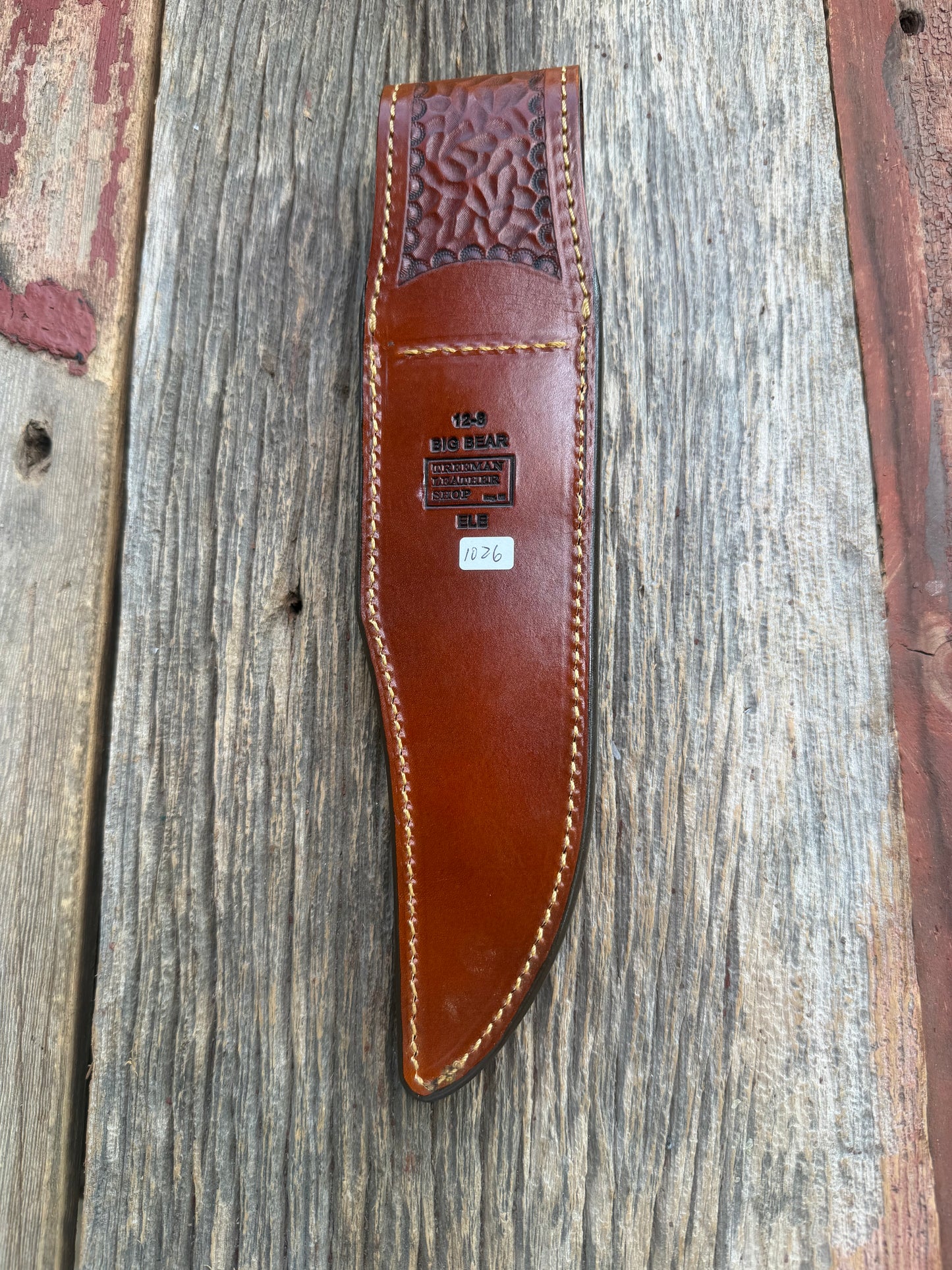 New Randall Model 12-8 Big Bear Sheath in Exotic thick and textured Rust colored Elephant hide on brown leather from Treeman with a silver Canteen snap. Hand tooled belt loop. Killer sheath.