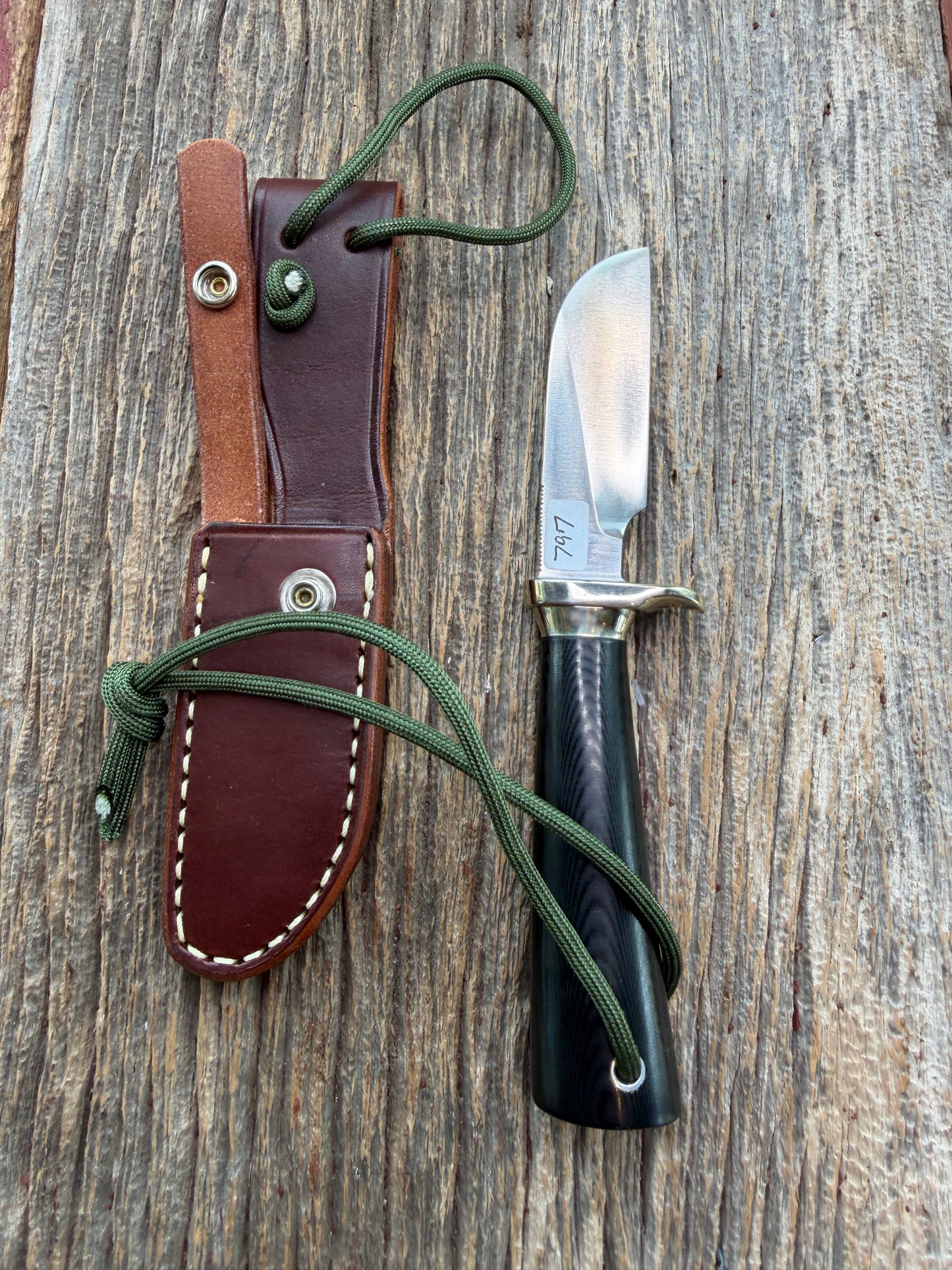 New Randall Non Catalog Model  Cattleman. Black Micarta handle. Nickel silver single hilt and collar. Stainless blade.
